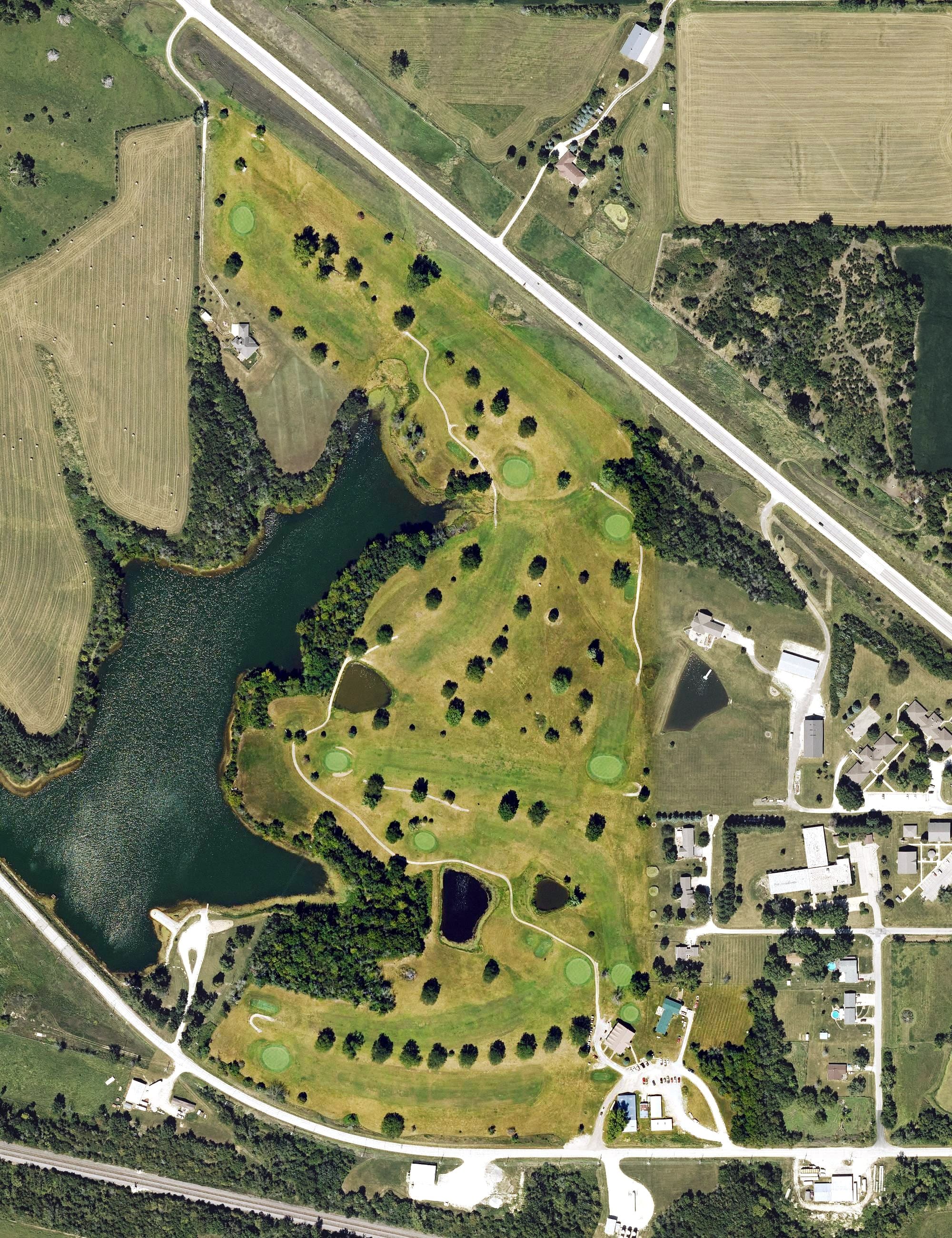 Aerial view of Lakeshore Golf and Country Club, IA, with its hole routing marked