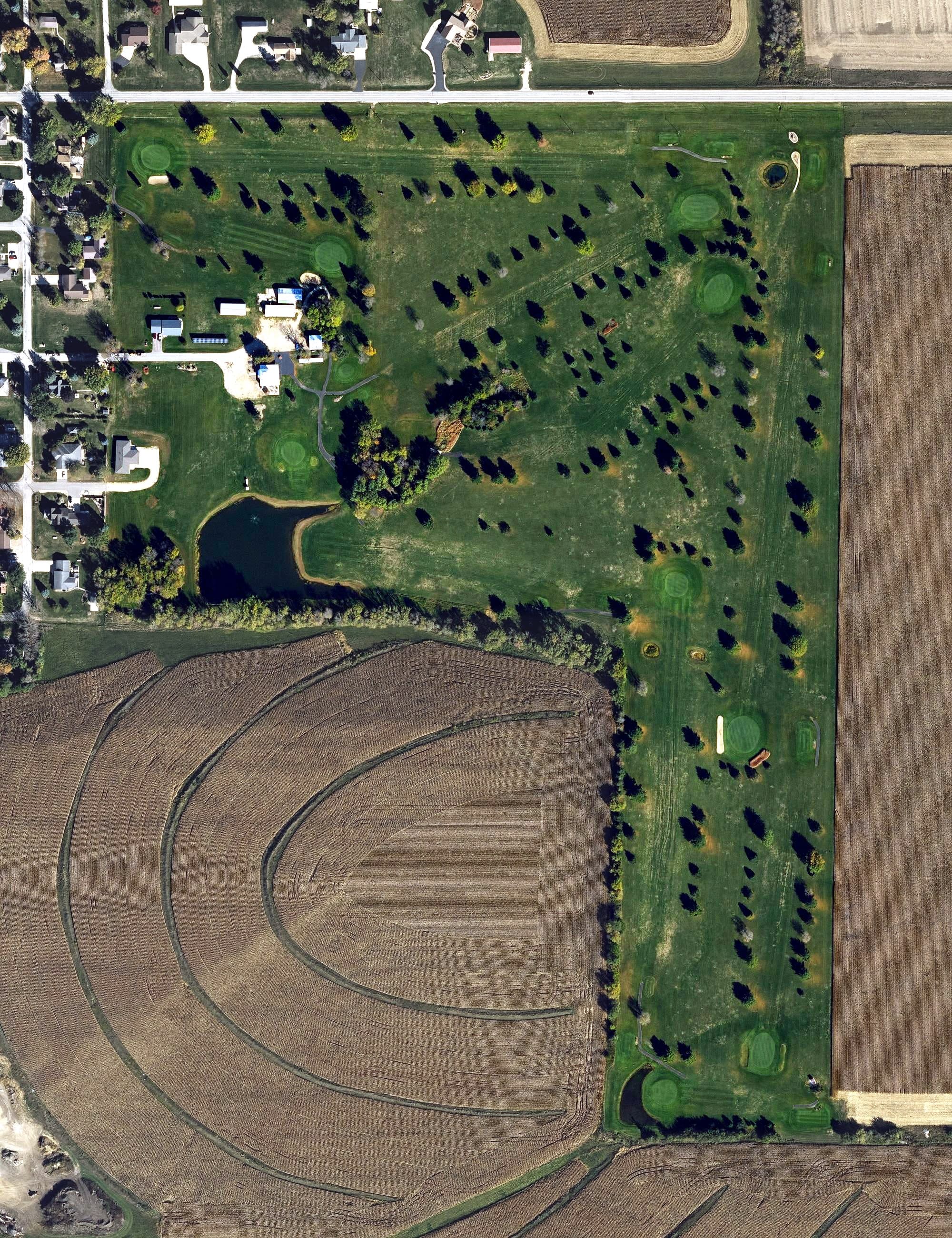 Aerial view of Maple Heights Golf and Country Club, IA, with its hole routing marked