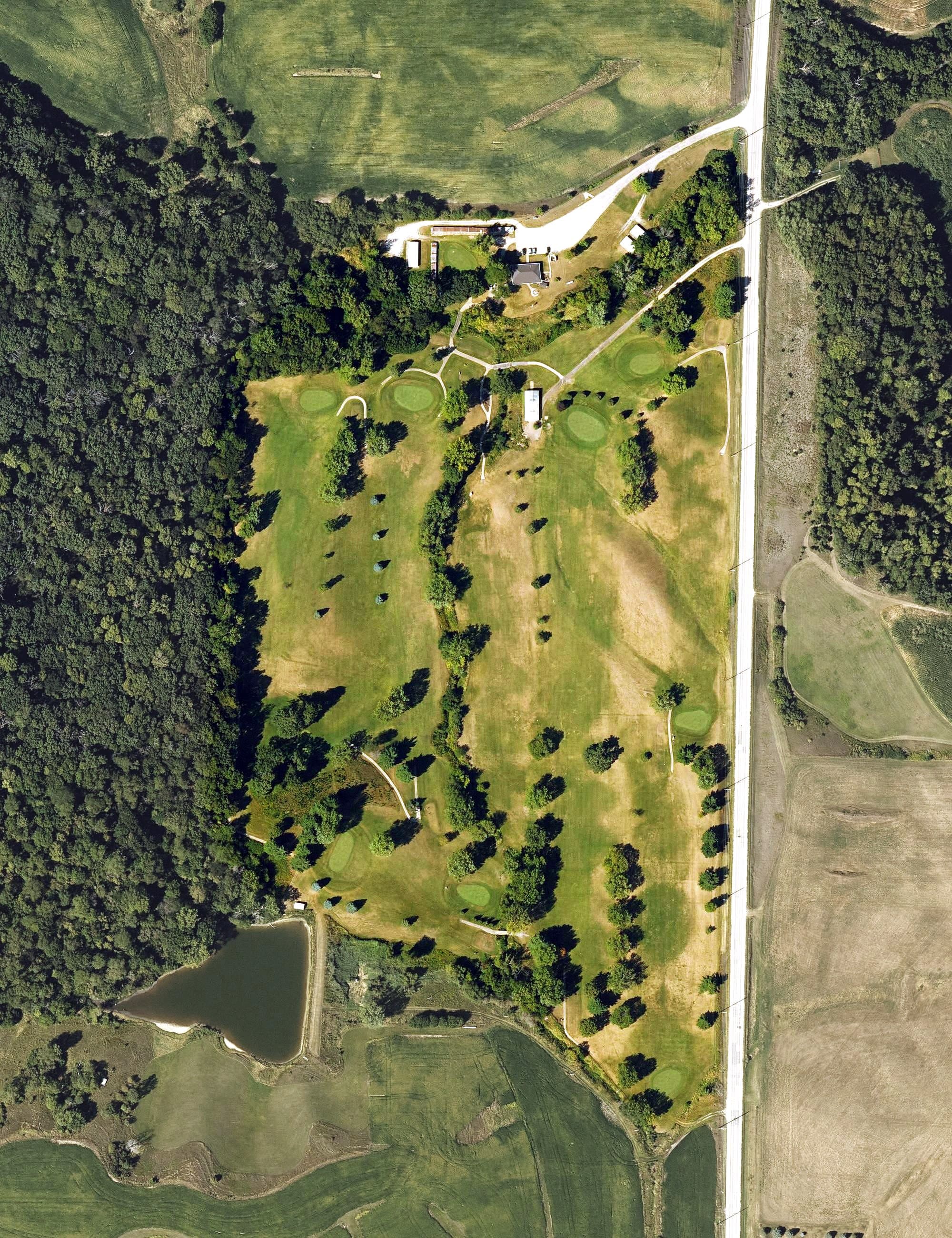 Aerial view of Marengo Golf Club, IA, with its hole routing marked