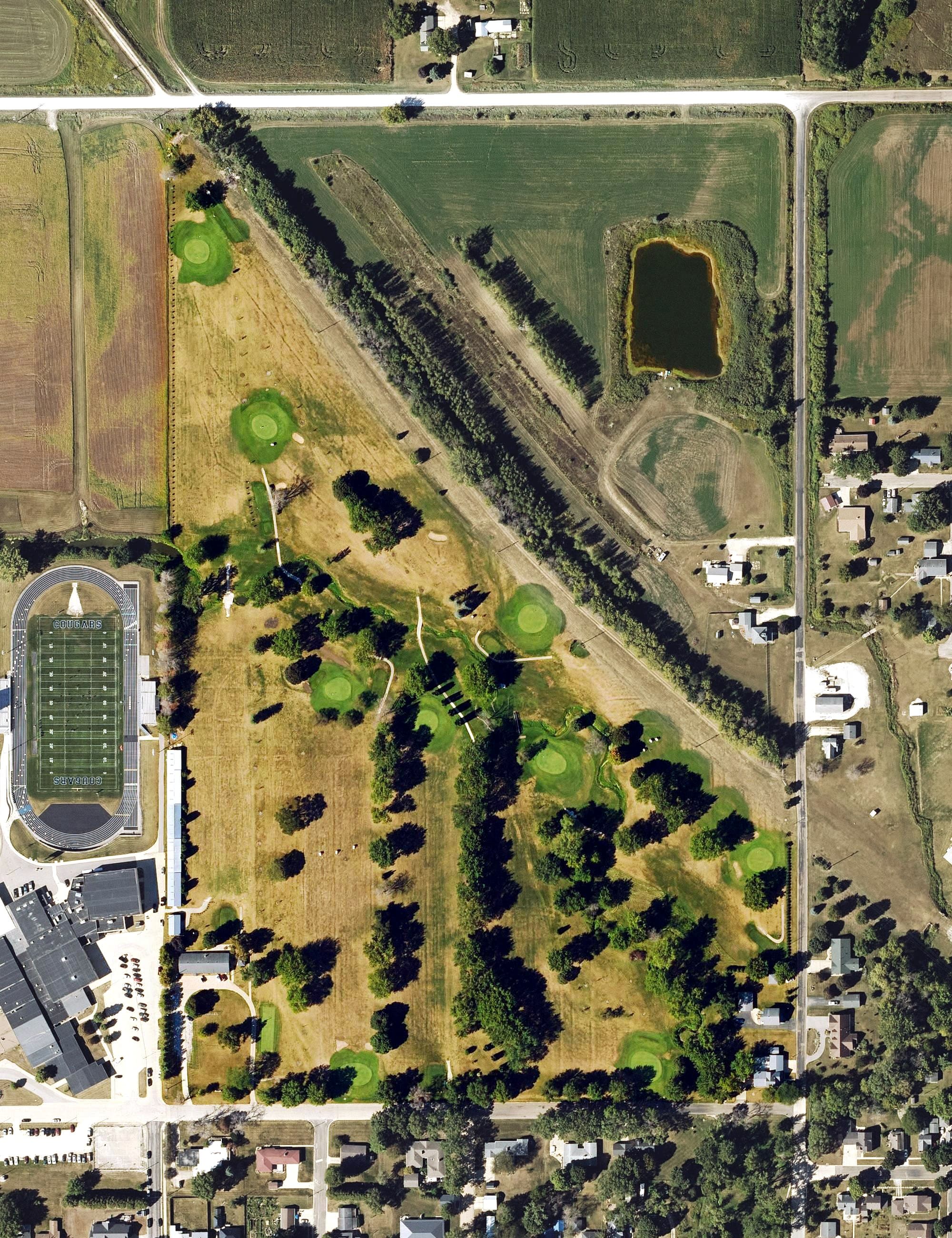 Aerial view of Meadowbrook Country Club, IA, with its hole routing marked