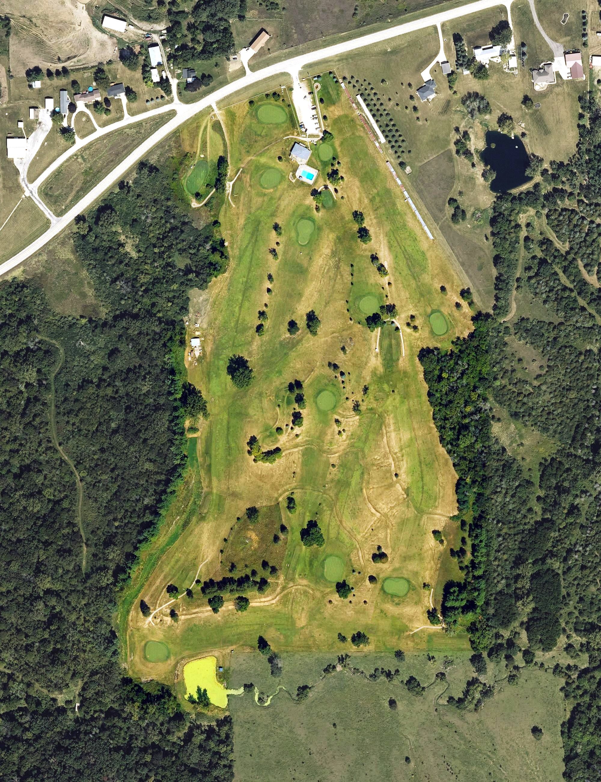 Aerial view of Montezuma Country Club, IA, with its hole routing marked