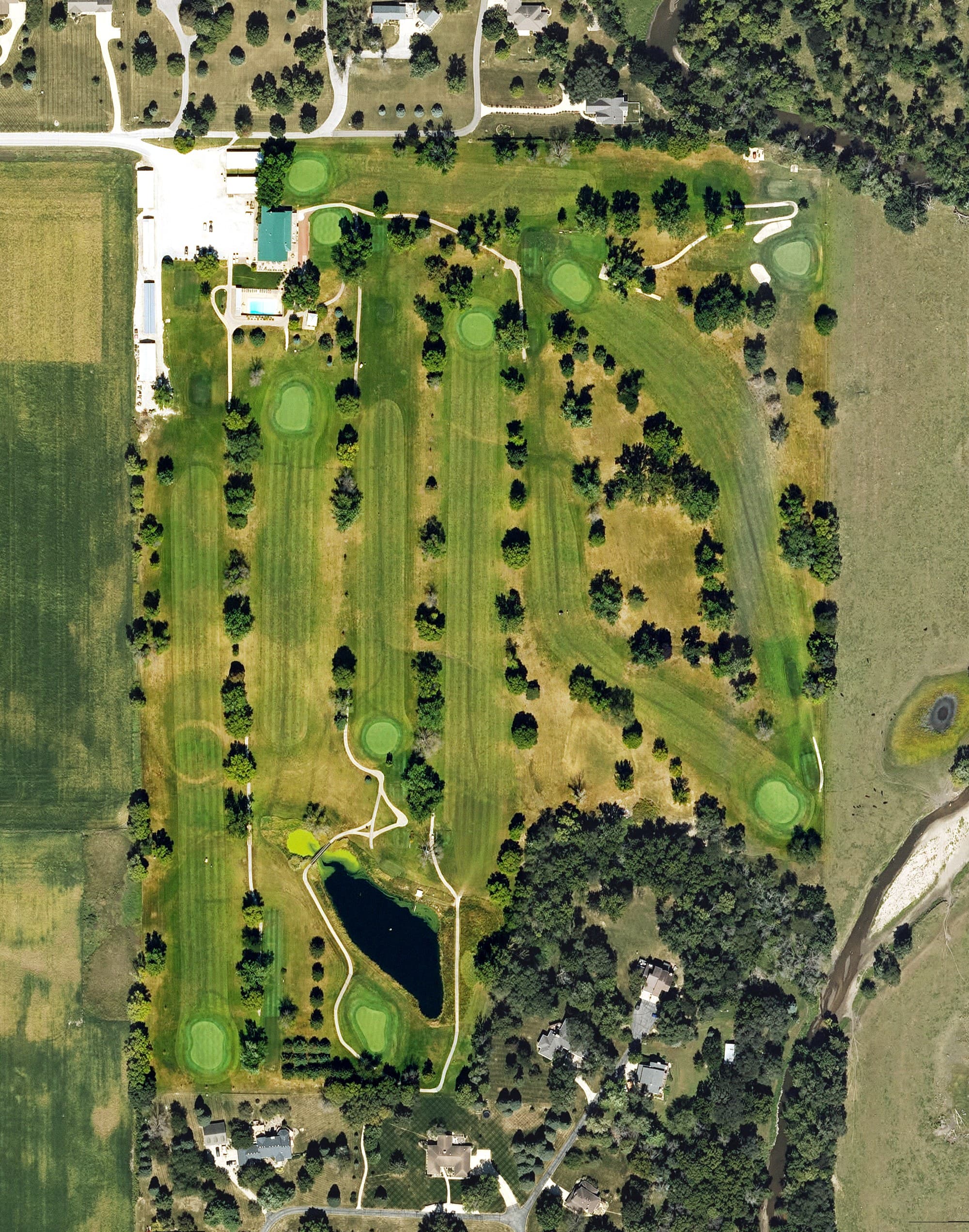 Aerial view of Perry Golf and Country Club, IA, with its hole routing marked