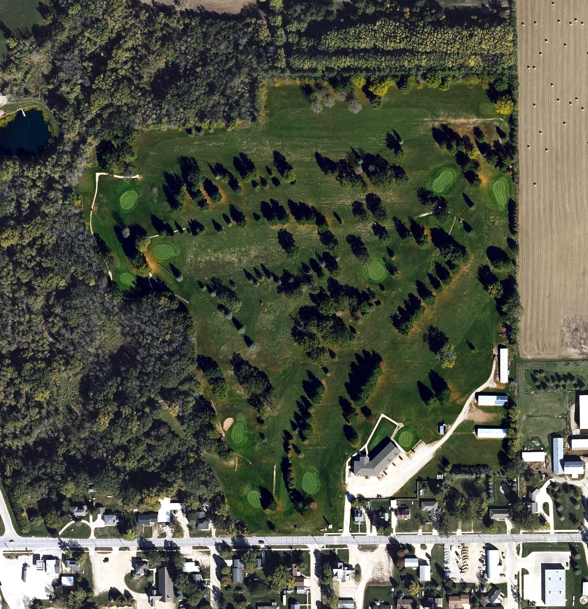 Aerial view of Riceville Country Club, IA, with its hole routing marked