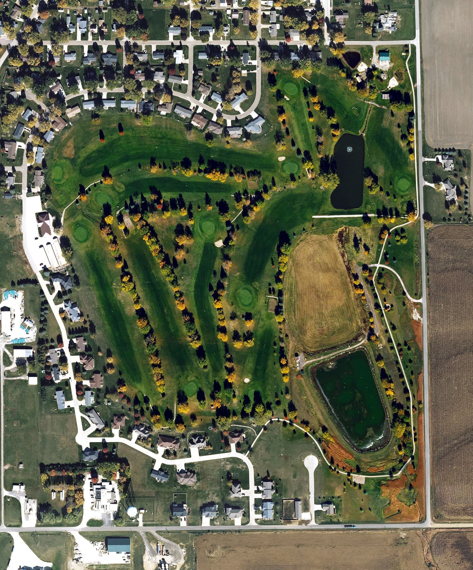 Aerial view of Schleswig Community Golf Club, IA, with its hole routing marked