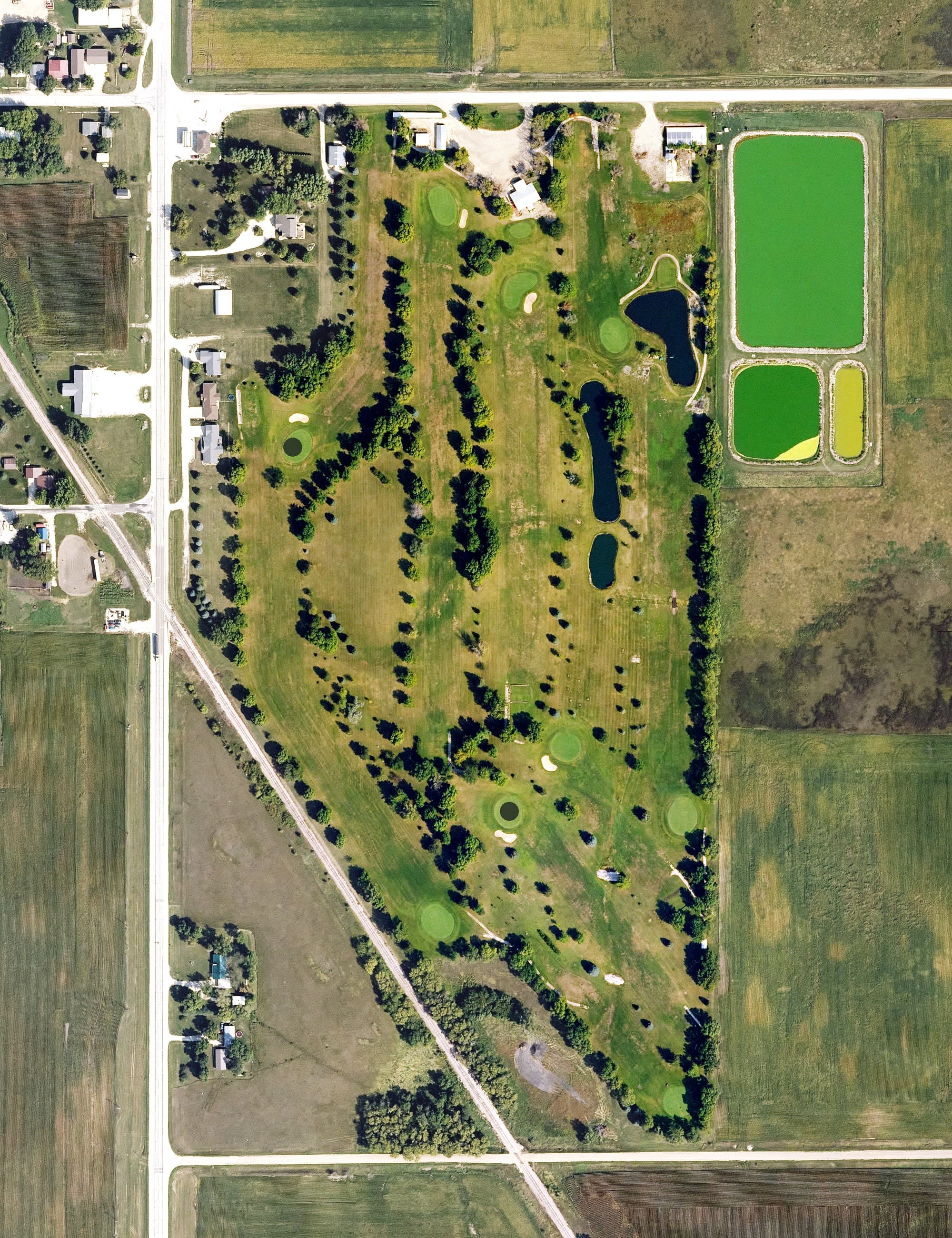 Aerial view of Spring Hills Country Club, IA, with its hole routing marked