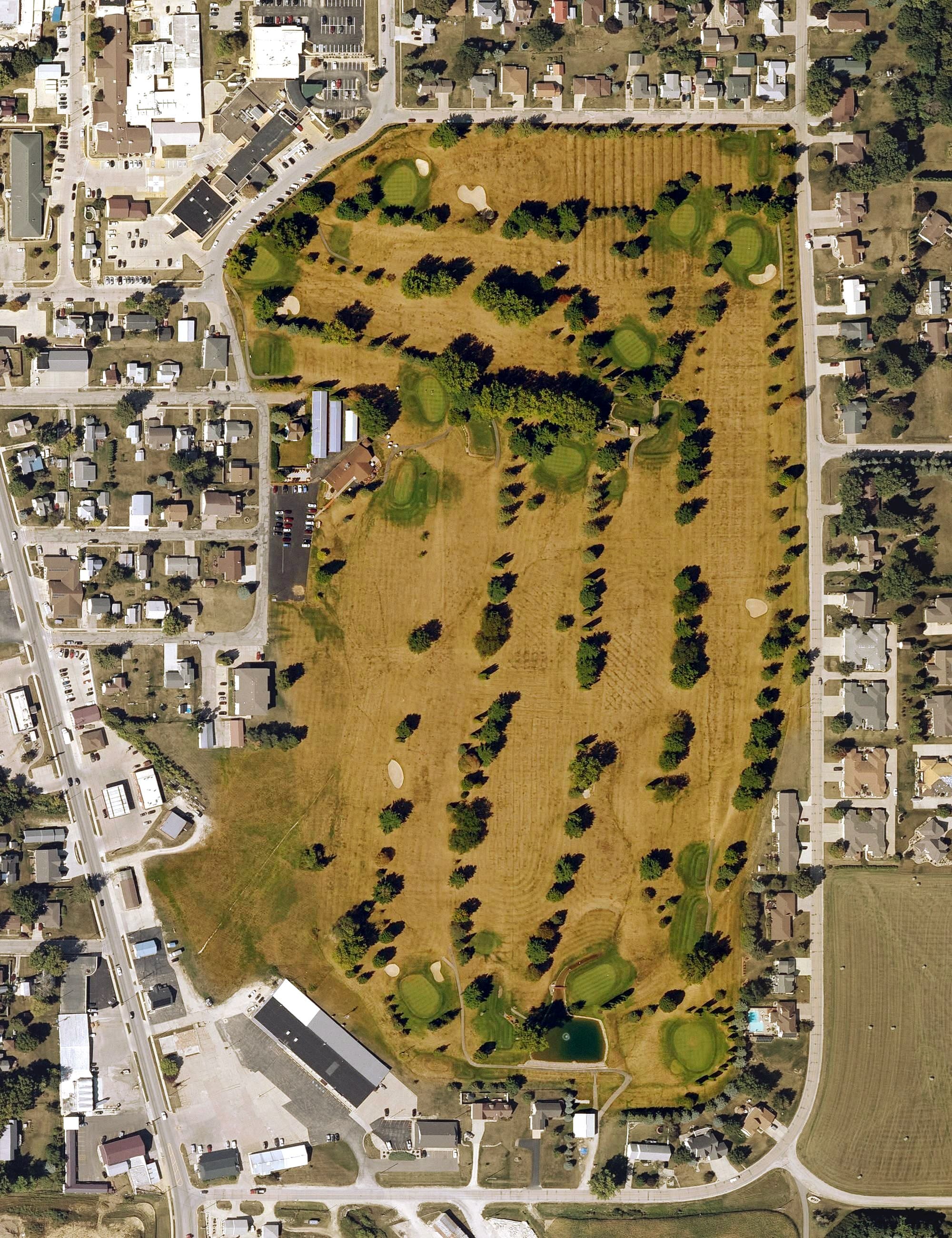 Aerial view of Waukon Golf and Country Club, IA, with its hole routing marked