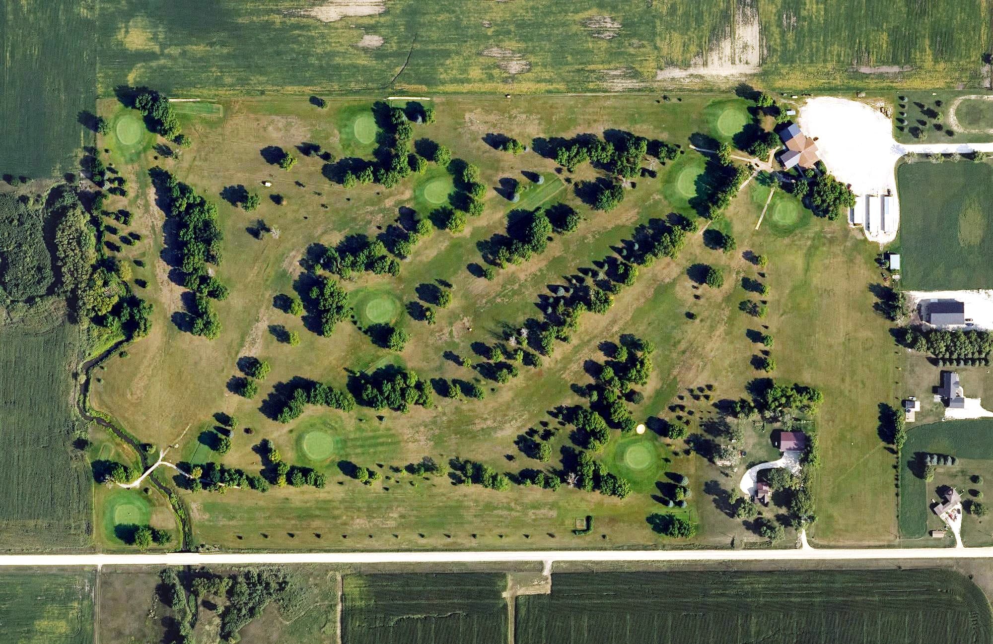 Aerial view of West Bend Golf and Country Club, IA, with its hole routing marked