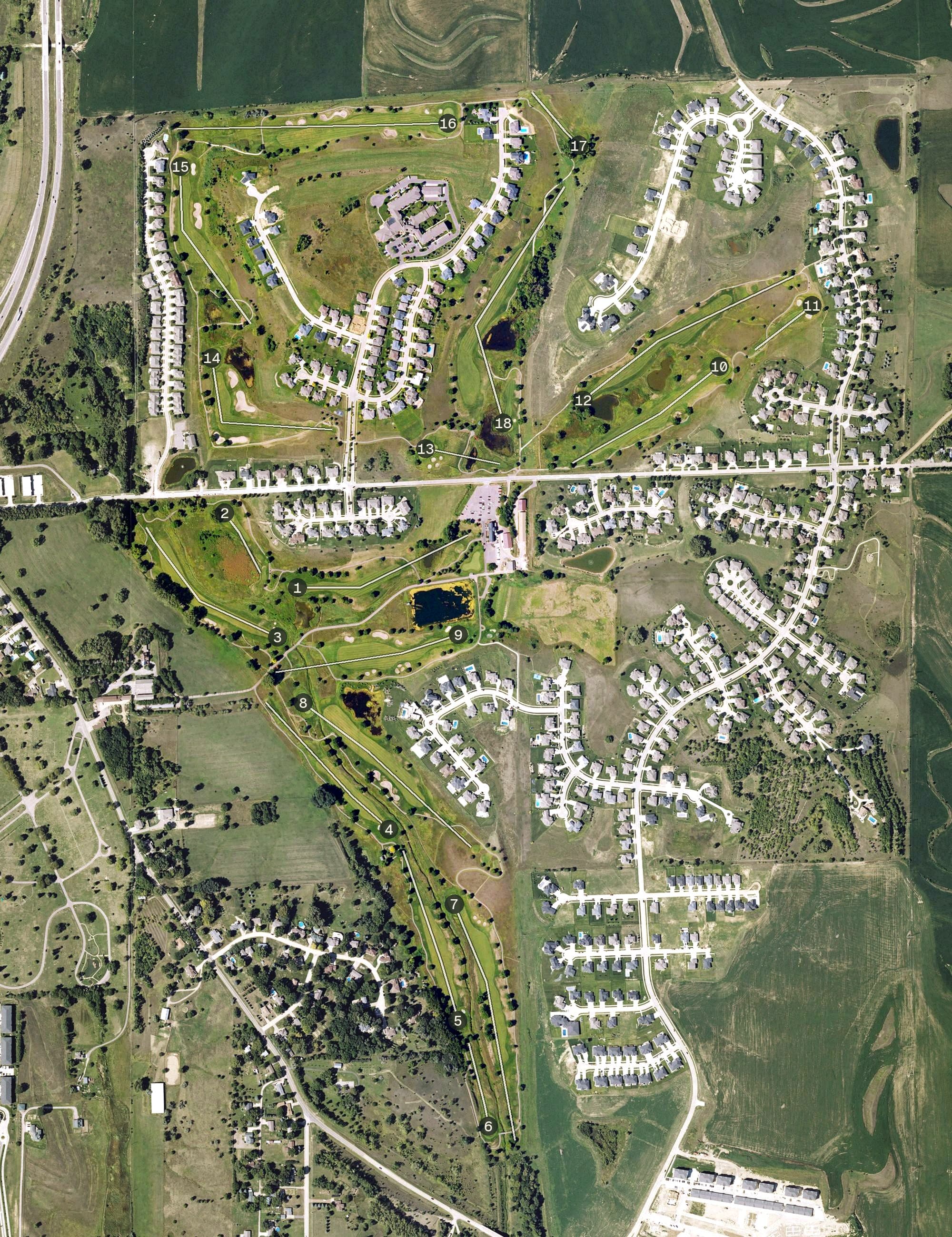 Aerial view of Whispering Creek Golf Club, IA, with its hole routing marked