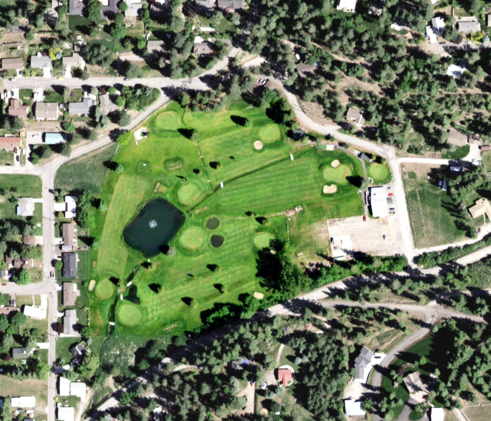 Aerial view of Ponderosa Springs Par 3, ID, with its hole routing marked
