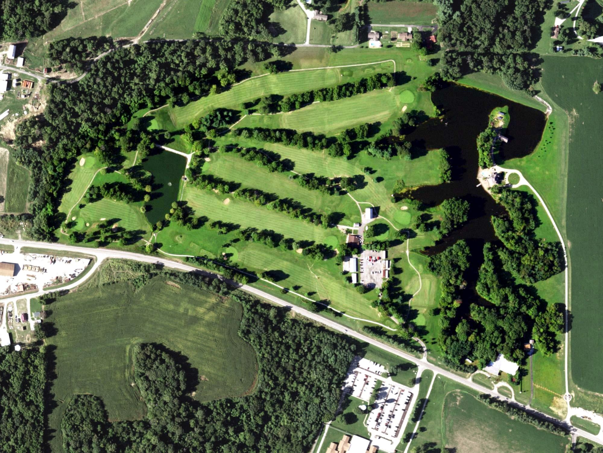 Aerial view of Chester Country Club, IL, with its hole routing marked
