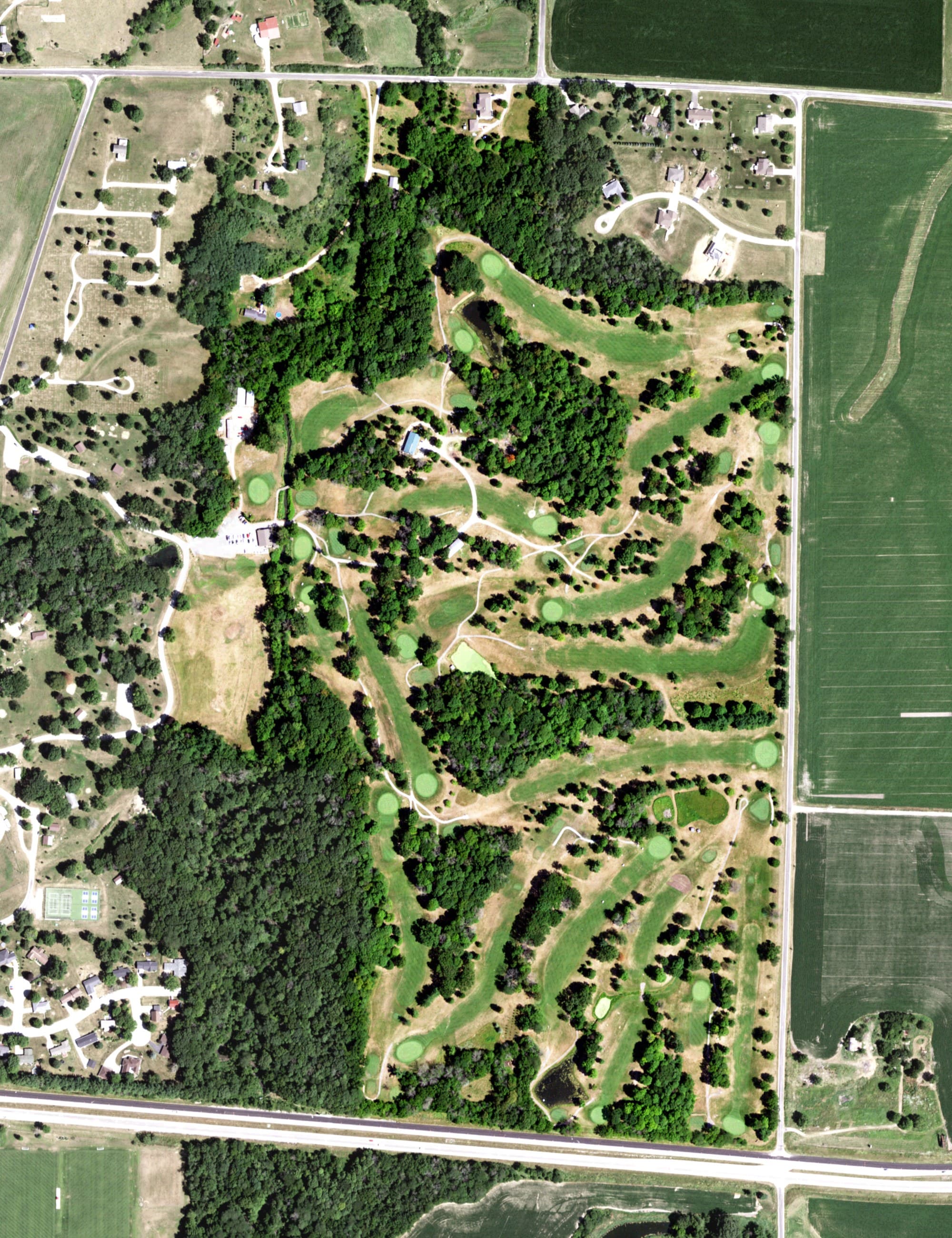 Aerial view of Gibson Woods Golf Course, IL, with its hole routing marked