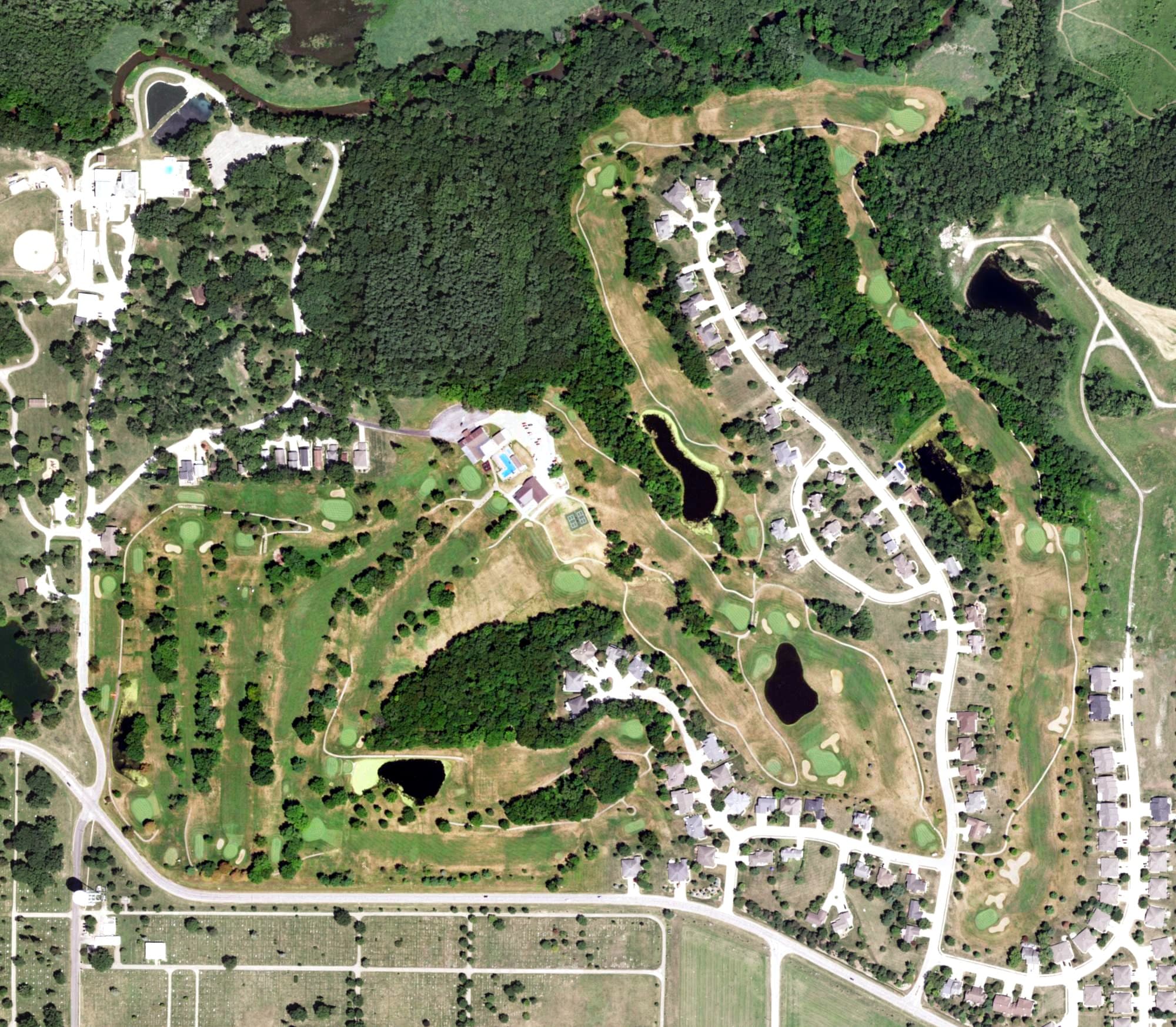 Aerial view of Macomb Country Club, IL, with its hole routing marked