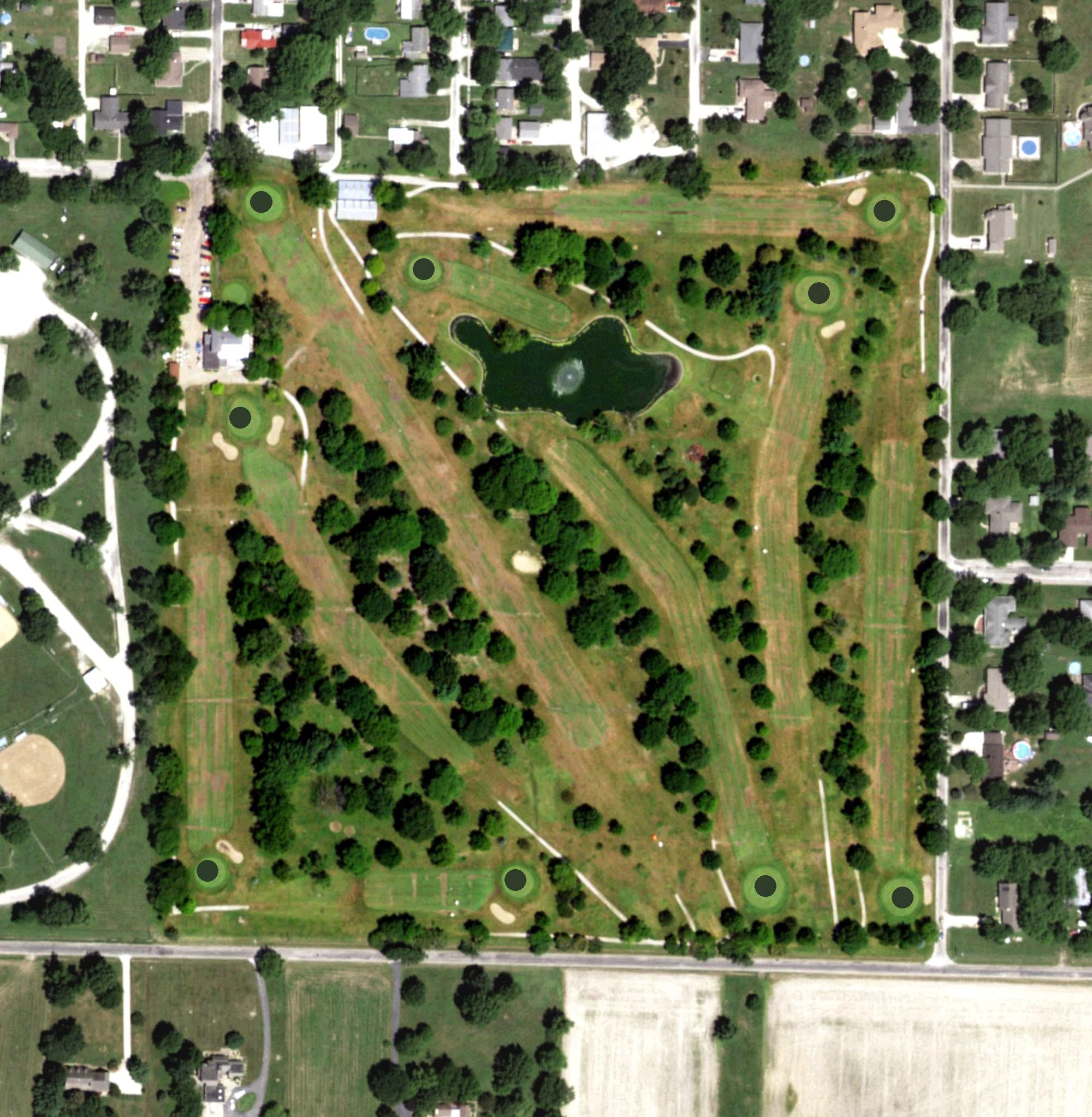 Aerial view of Pana Country Club, IL, with its hole routing marked