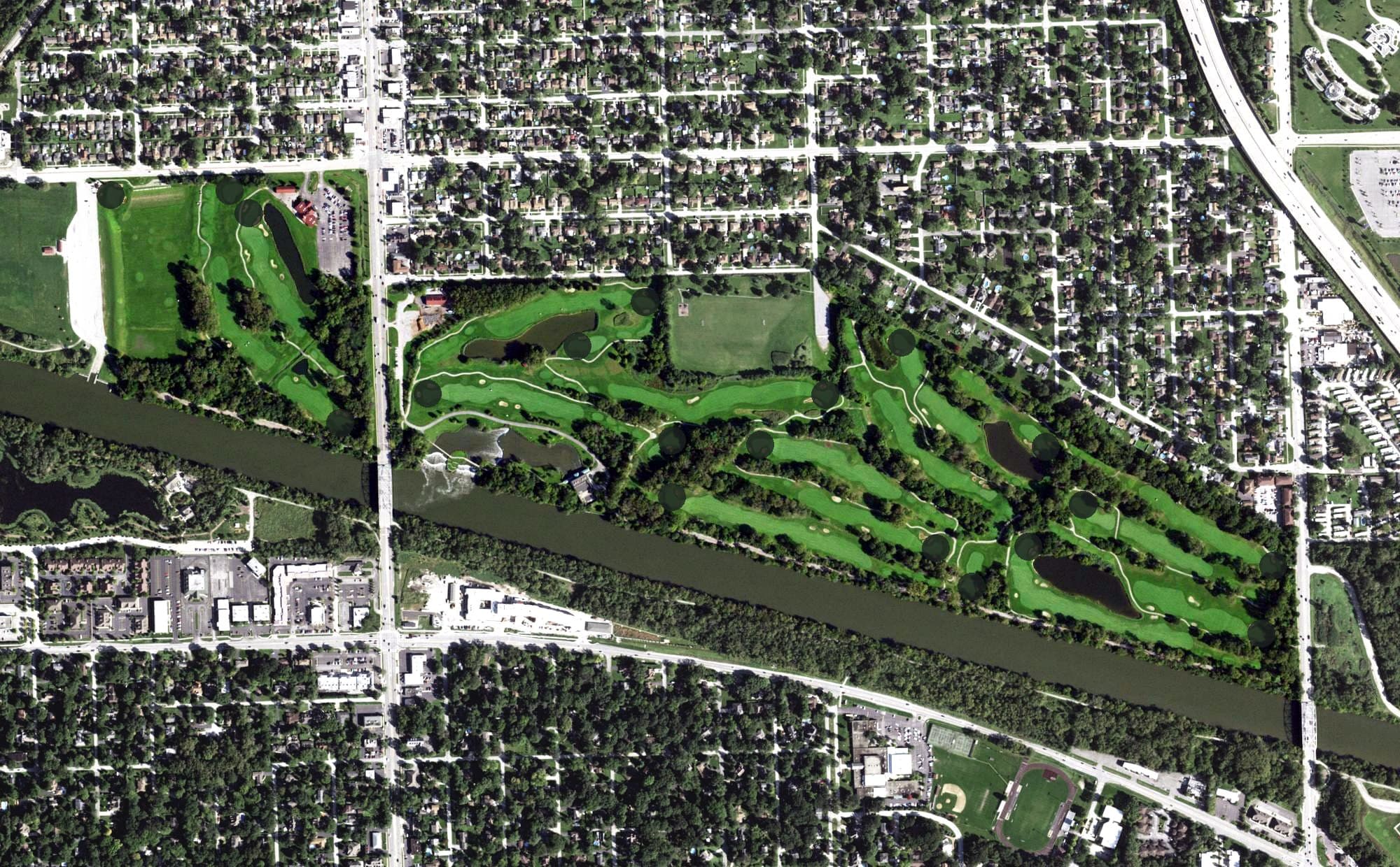 Aerial view of Water's Edge Golf Club, IL, with its hole routing marked