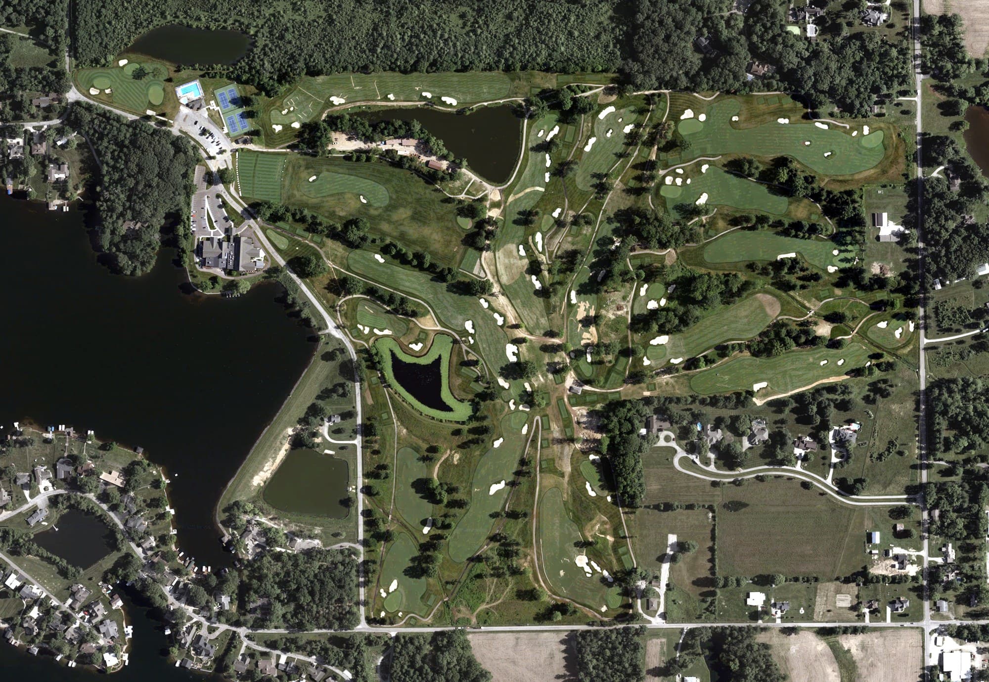 Aerial view of Harrison Lake Country Club, IN, with its hole routing marked