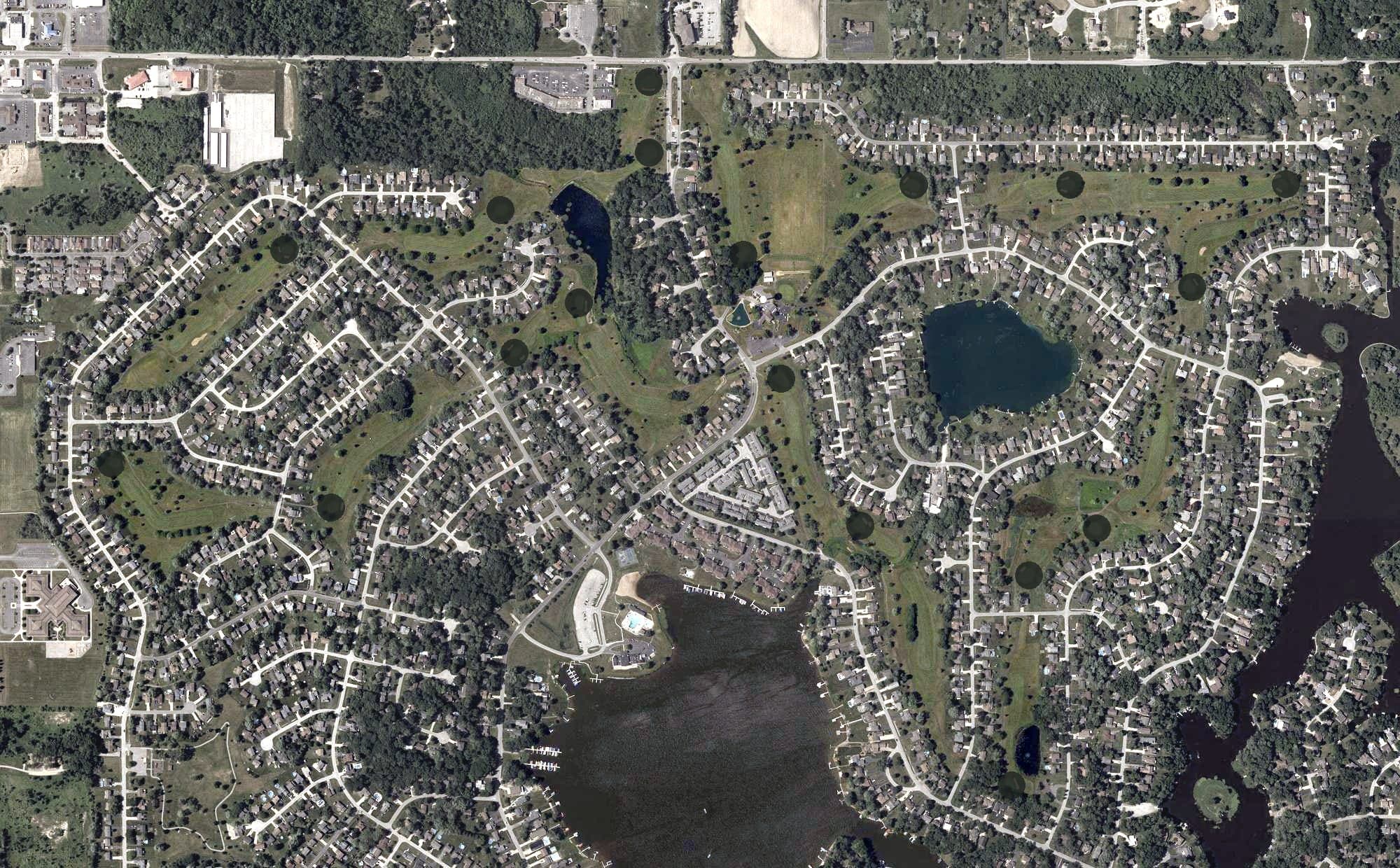 Aerial view of Lakes of the Four Seasons Golf Course, IN, with its hole routing marked