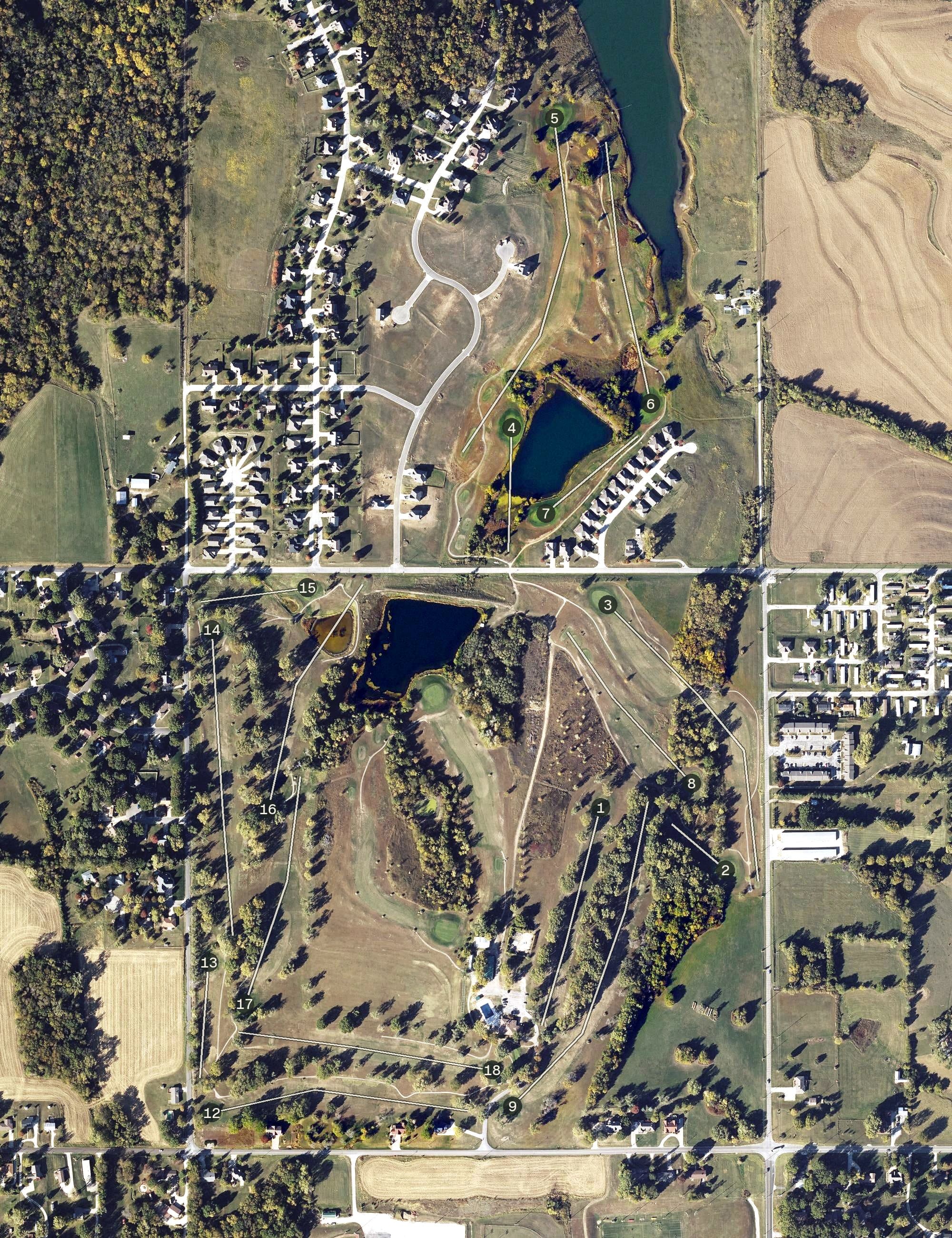 Aerial view of Atchison Golf Club at Bellevue, KS, with its hole routing marked