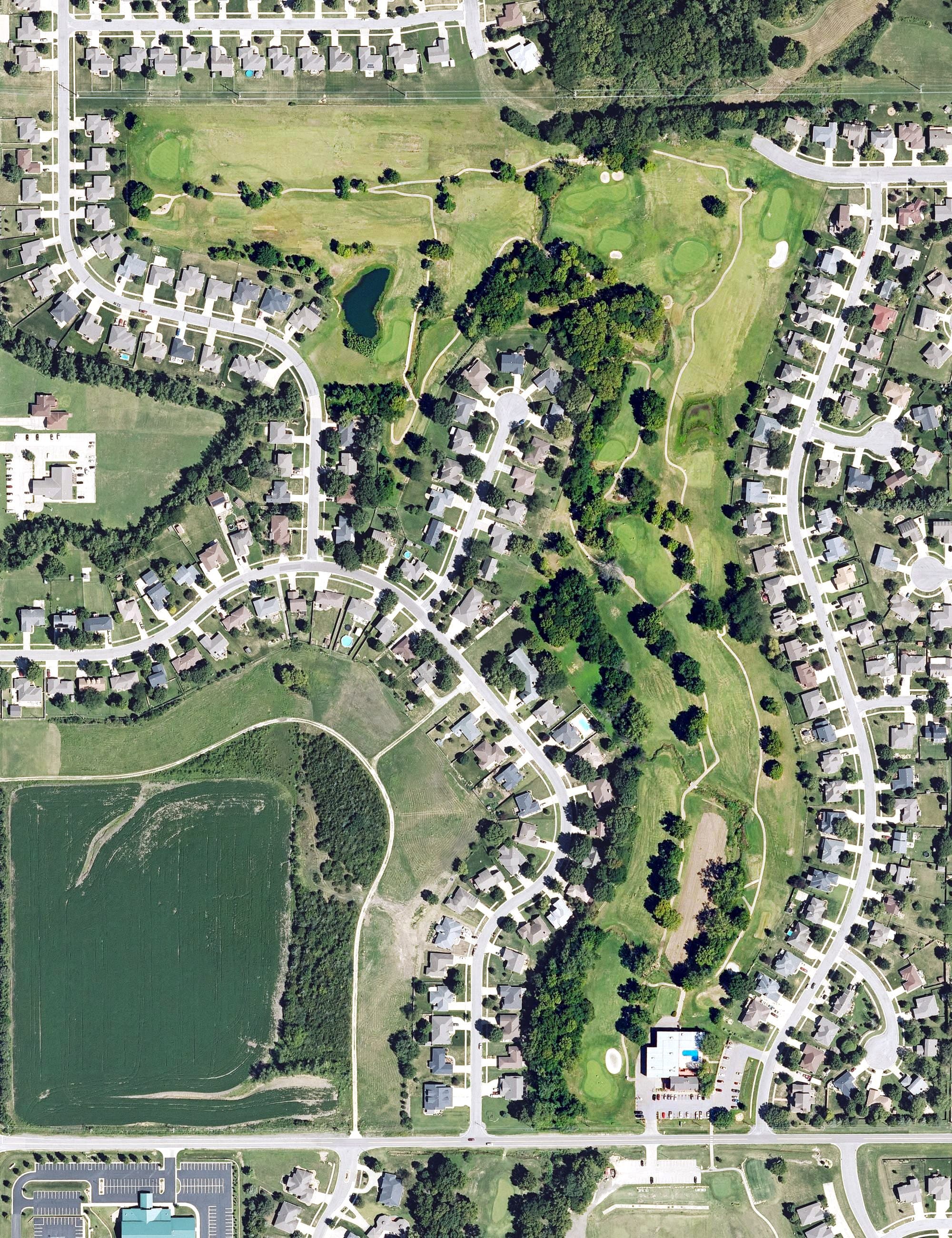 Aerial view of Berkshire Country Club, KS, with its hole routing marked
