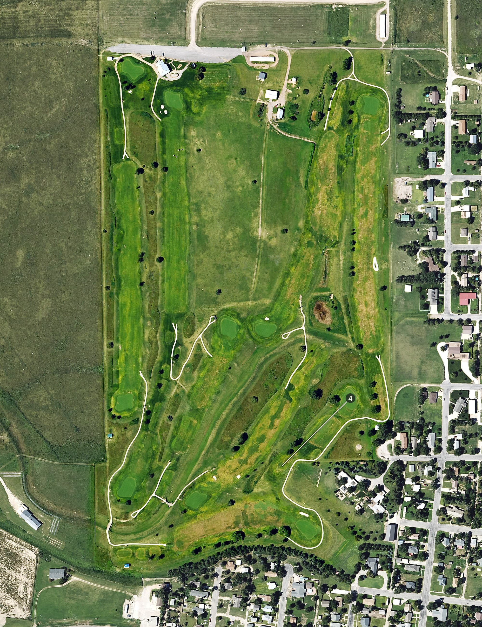 Aerial view of Cimarron Golf Club, KS, with its hole routing marked