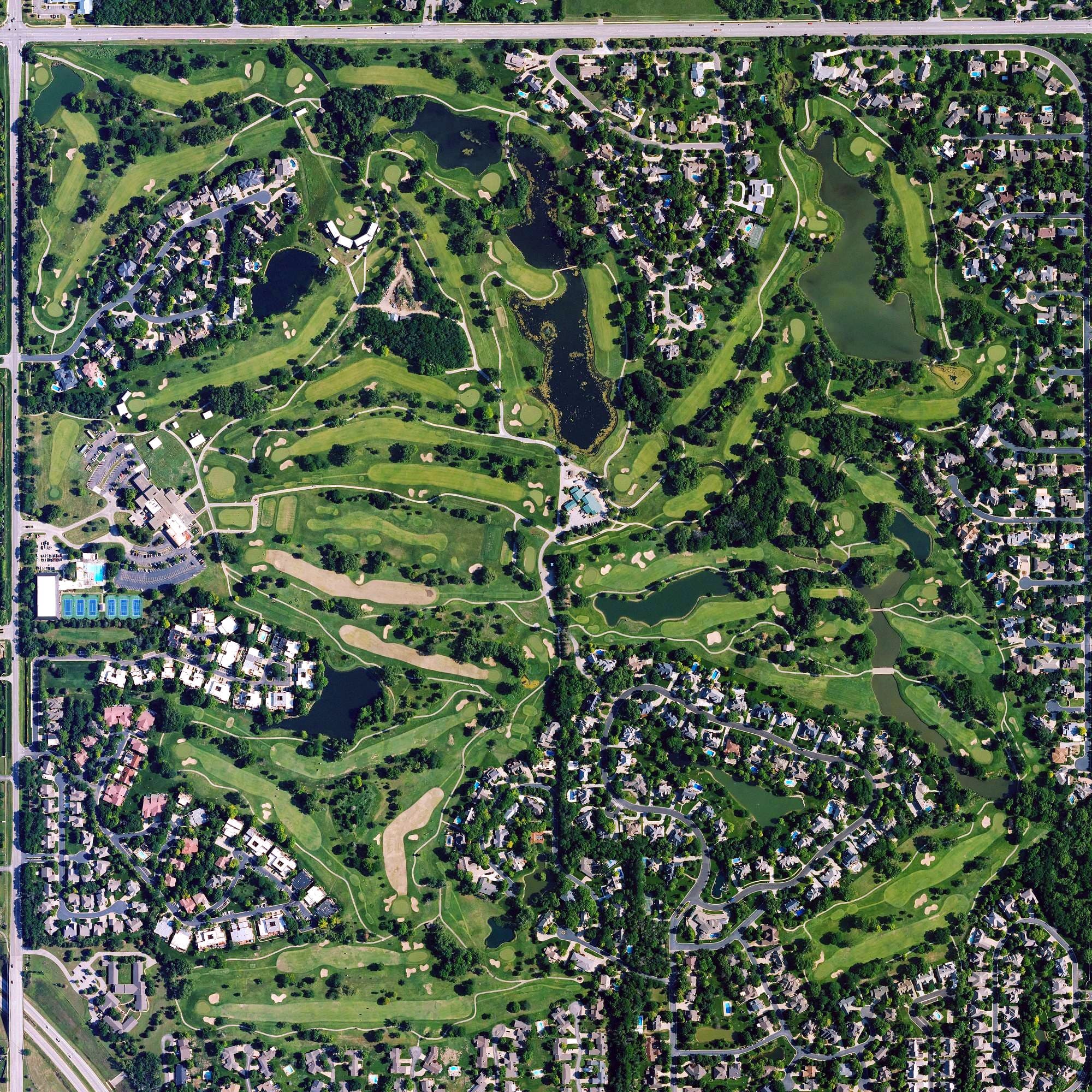 Aerial view of Crestview Country Club, KS, with its hole routing marked