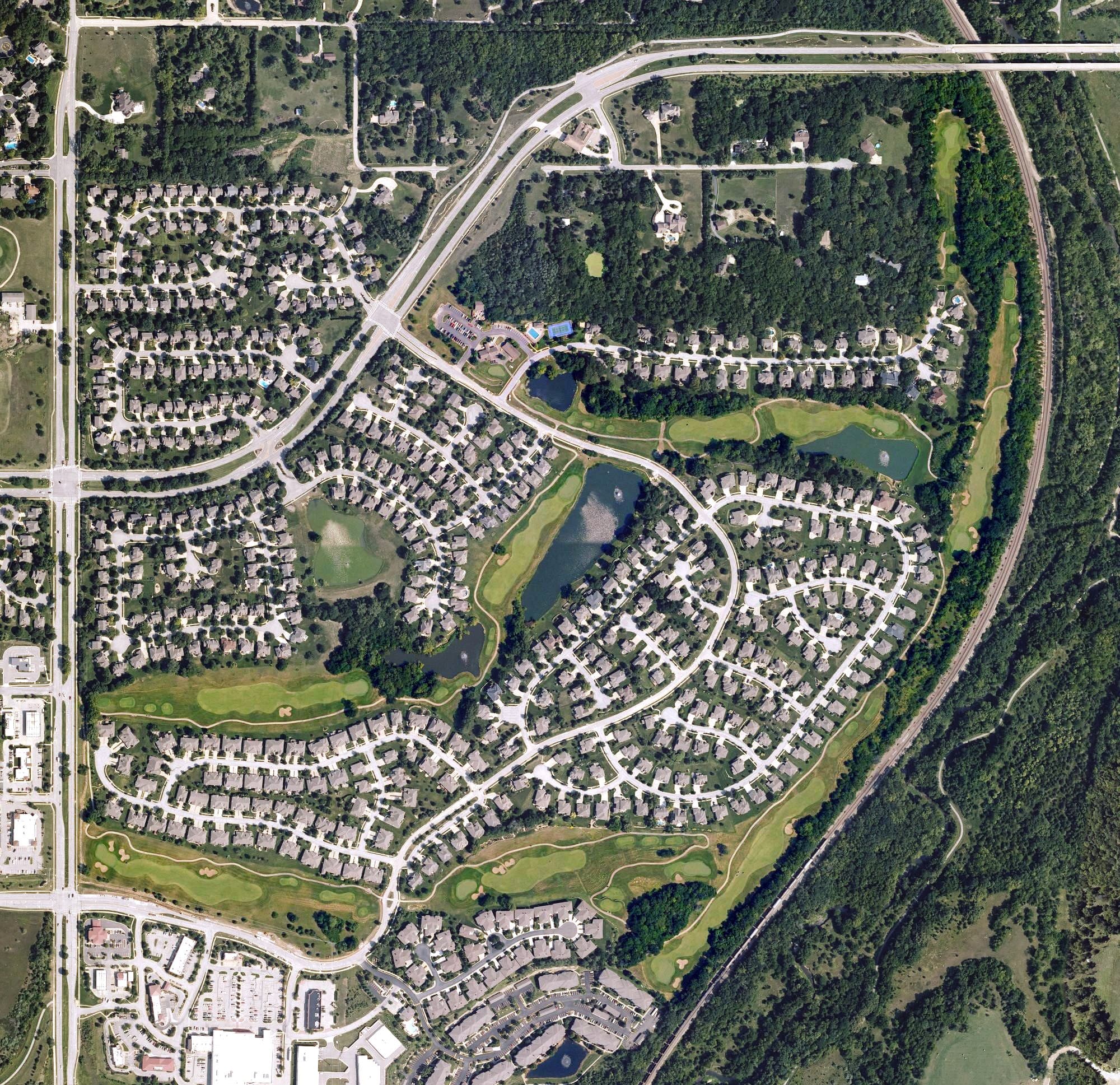 Aerial view of Falcon Valley Golf Course, KS, with its hole routing marked
