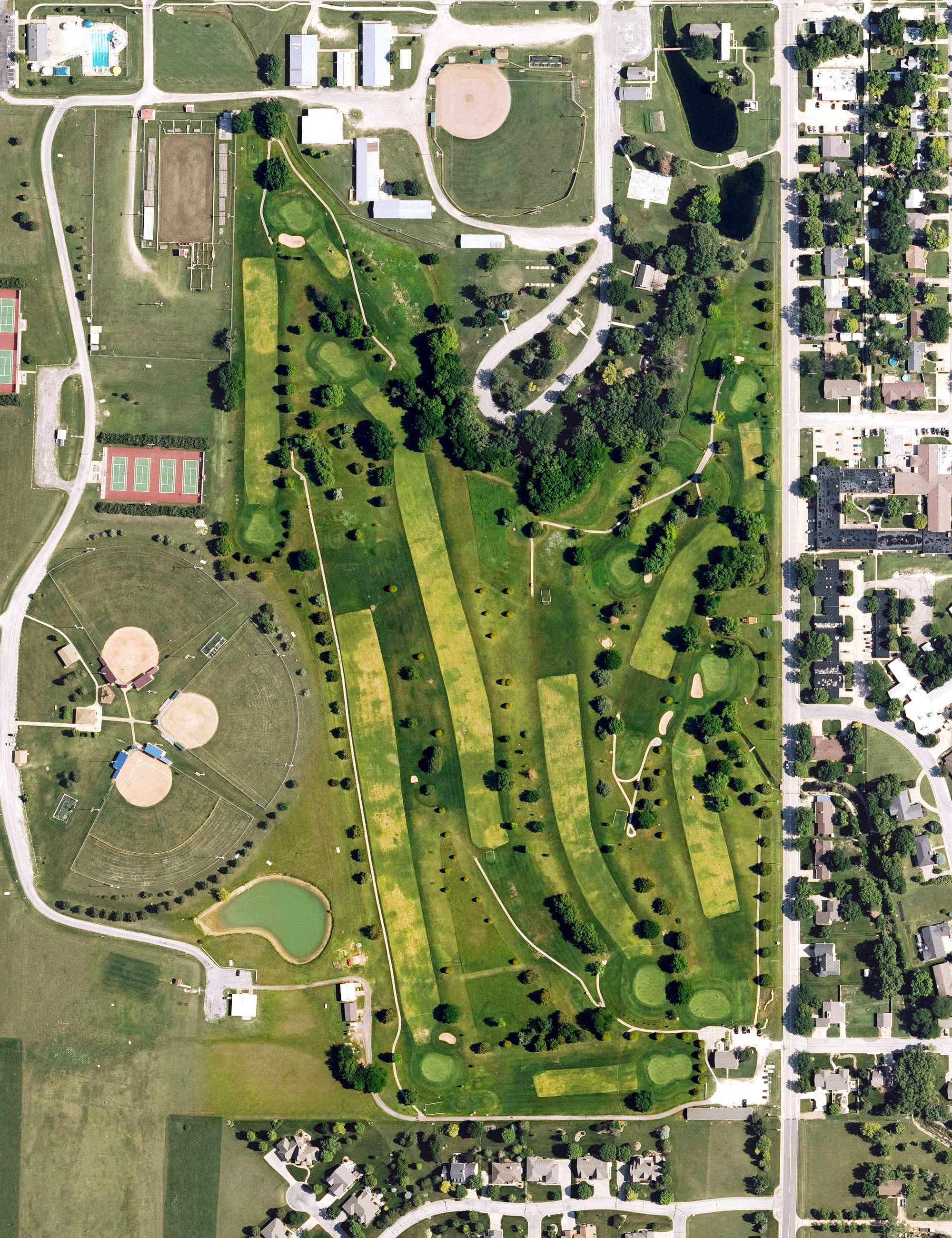 Aerial view of Hillsboro Municipal Golf Course, KS, with its hole routing marked