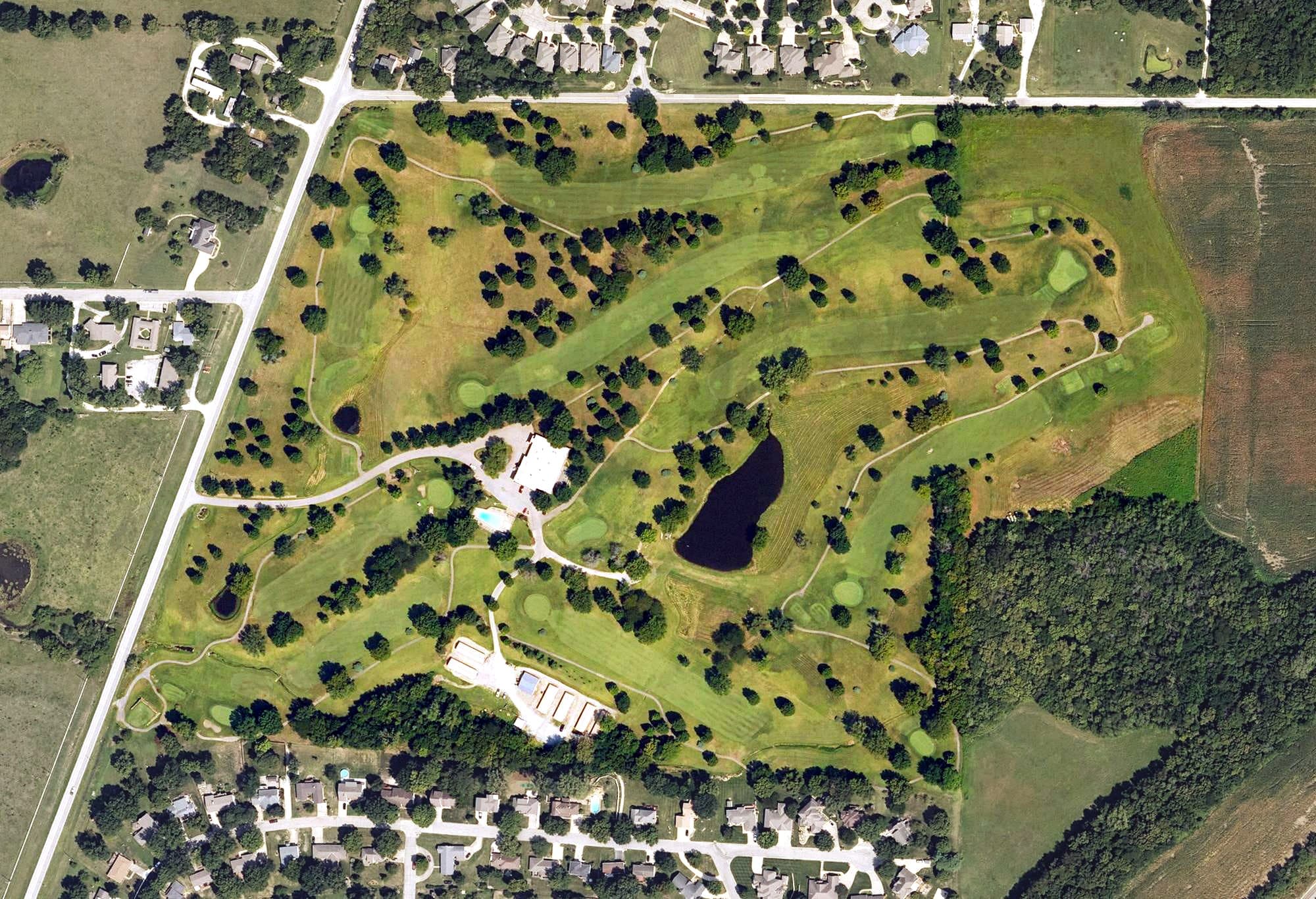 Aerial view of Paola Golf Club, KS, with its hole routing marked