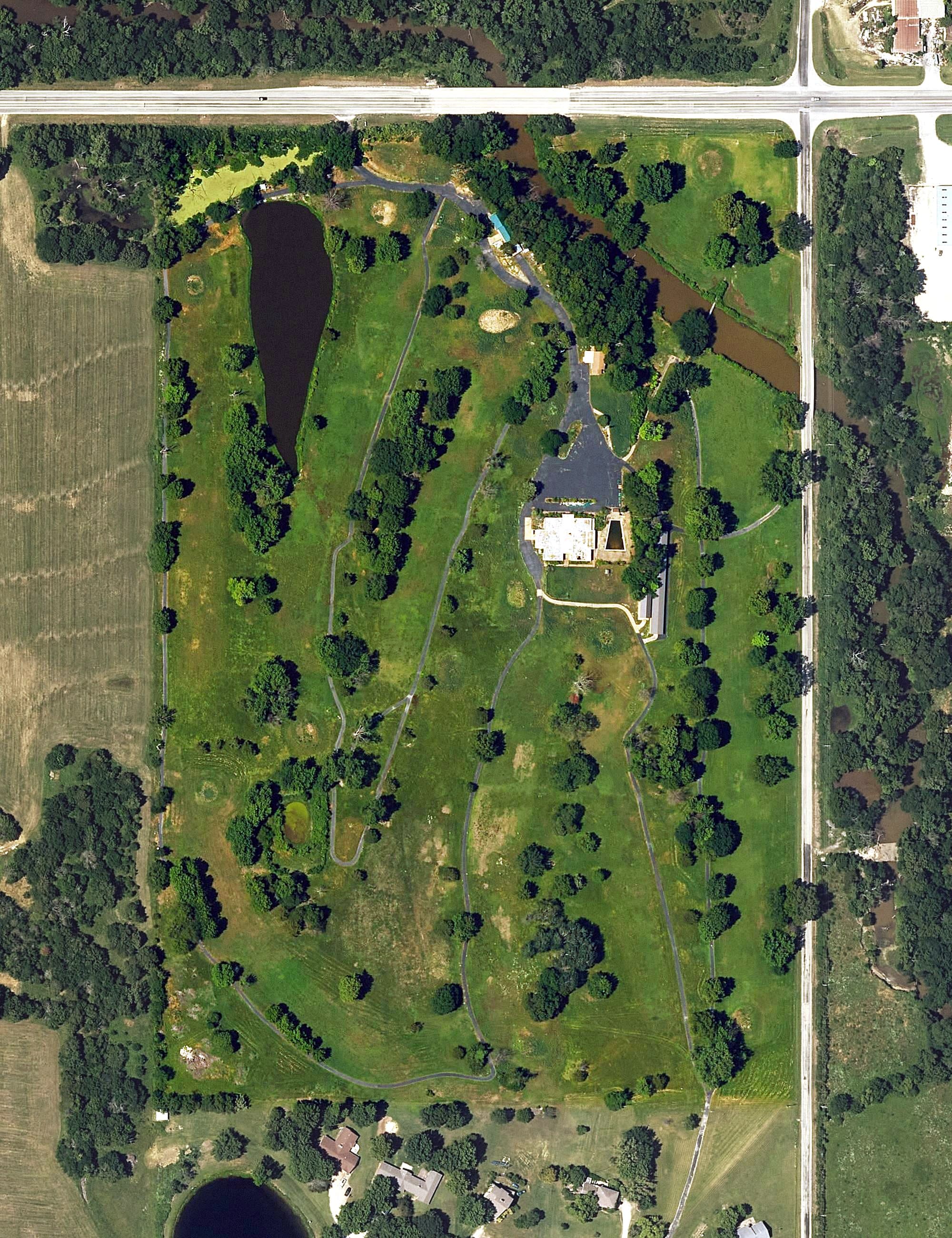 Aerial view of Parsons Country Club, KS, with its hole routing marked