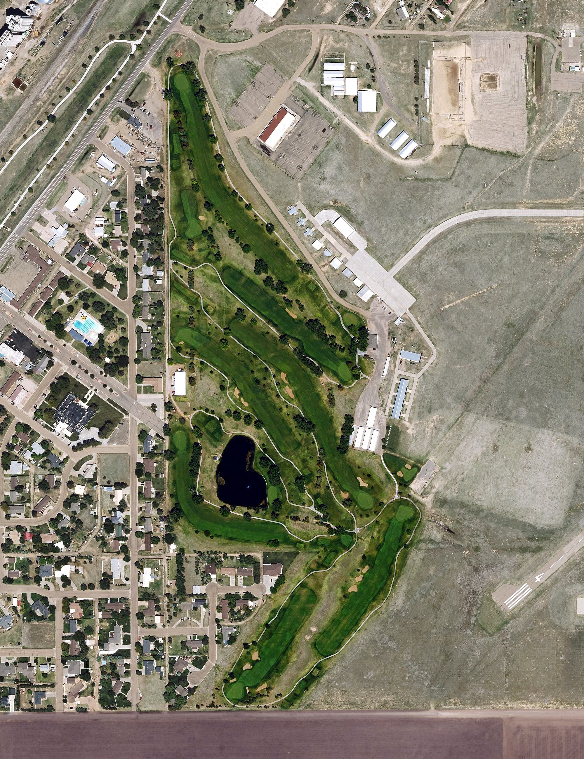 Aerial view of Point Rock Golf Club, KS, with its hole routing marked