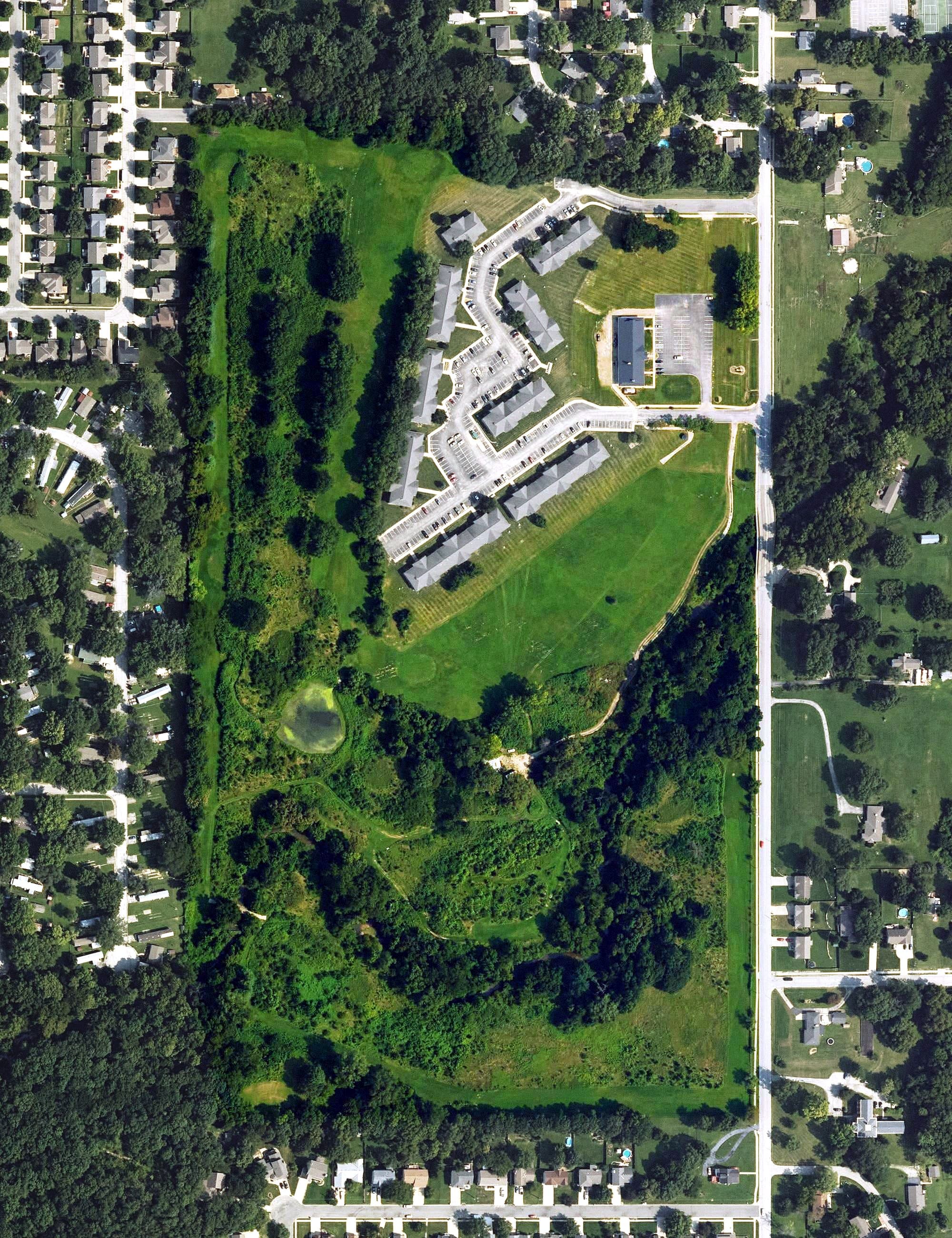Aerial view of The Oaks Golf Course, KS, with its hole routing marked