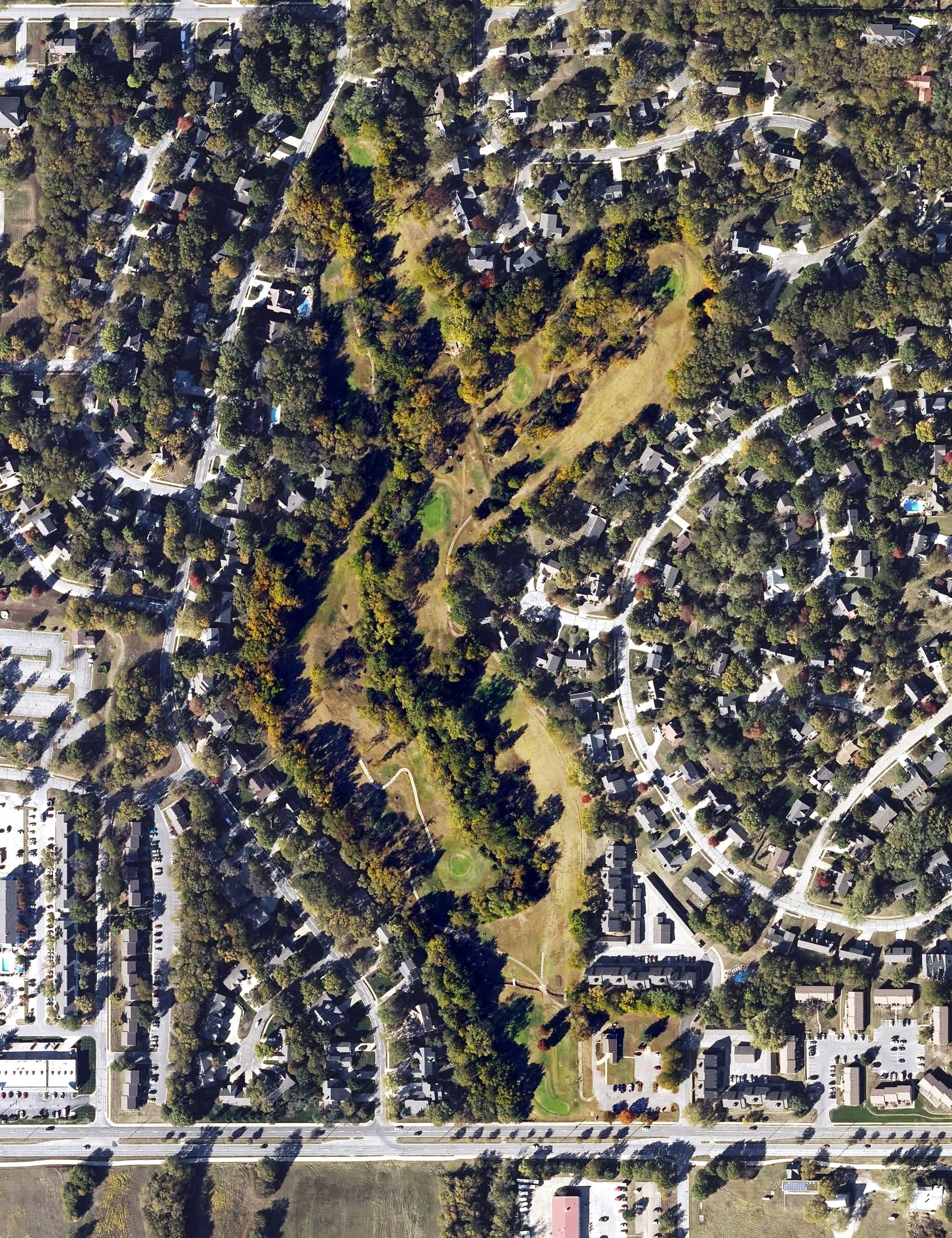 Aerial view of The Orchards Executive Golf Course, KS, with its hole routing marked