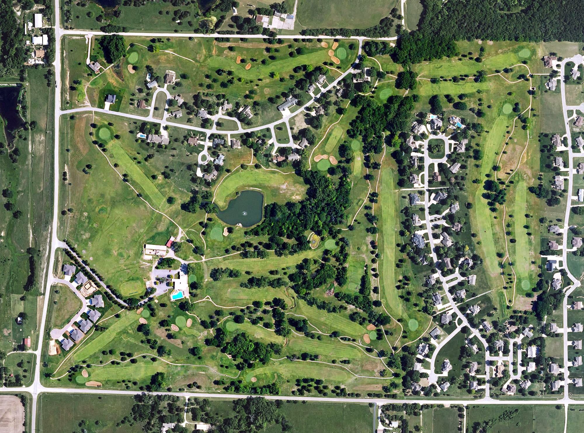 Aerial view of Winfield Country Club, KS, with its hole routing marked