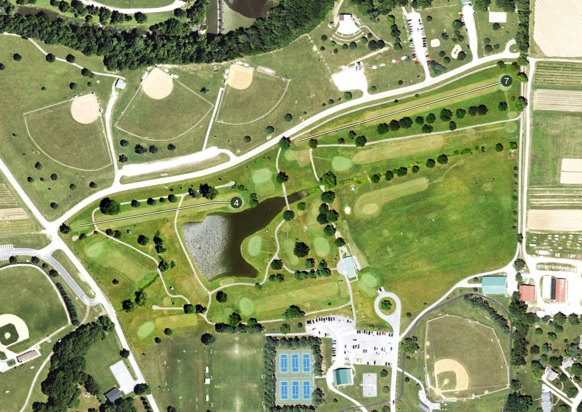 Aerial view of Clear Creek Golf Center, KY, with its hole routing marked
