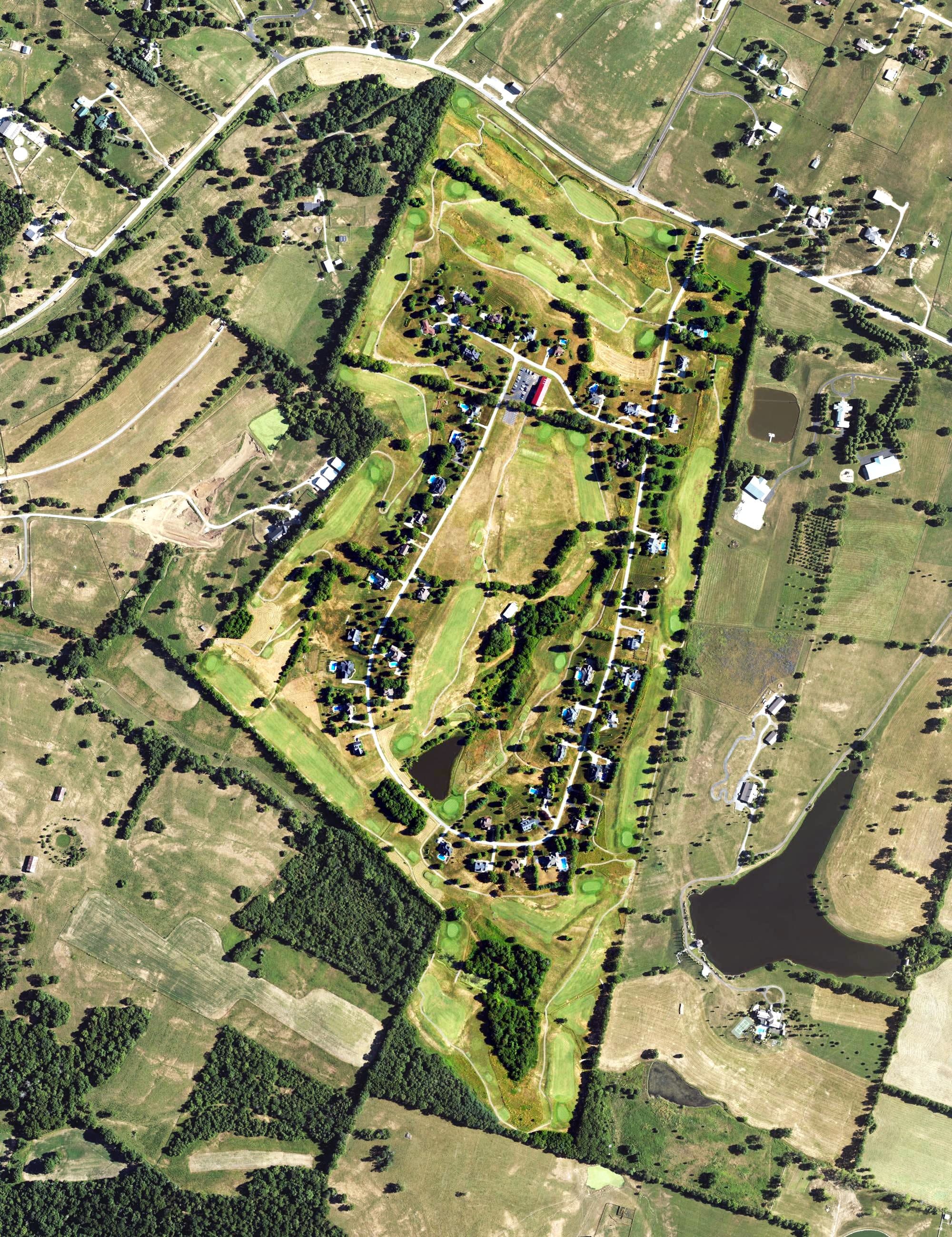Aerial view of Thoroughbred Golf Club, KY, with its hole routing marked