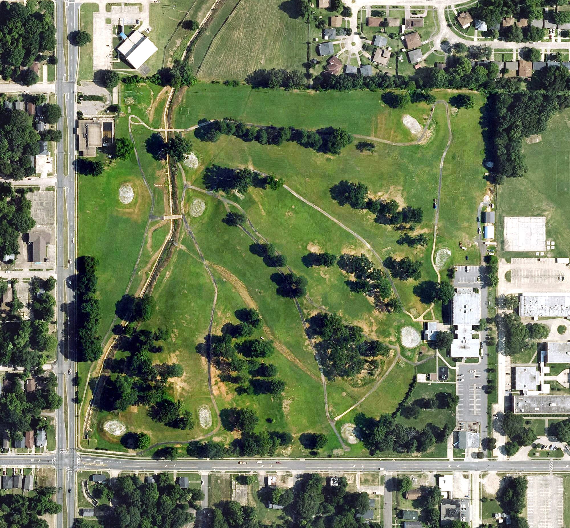 Aerial view of Jerry Brooks Golf Course, LA, with its hole routing marked