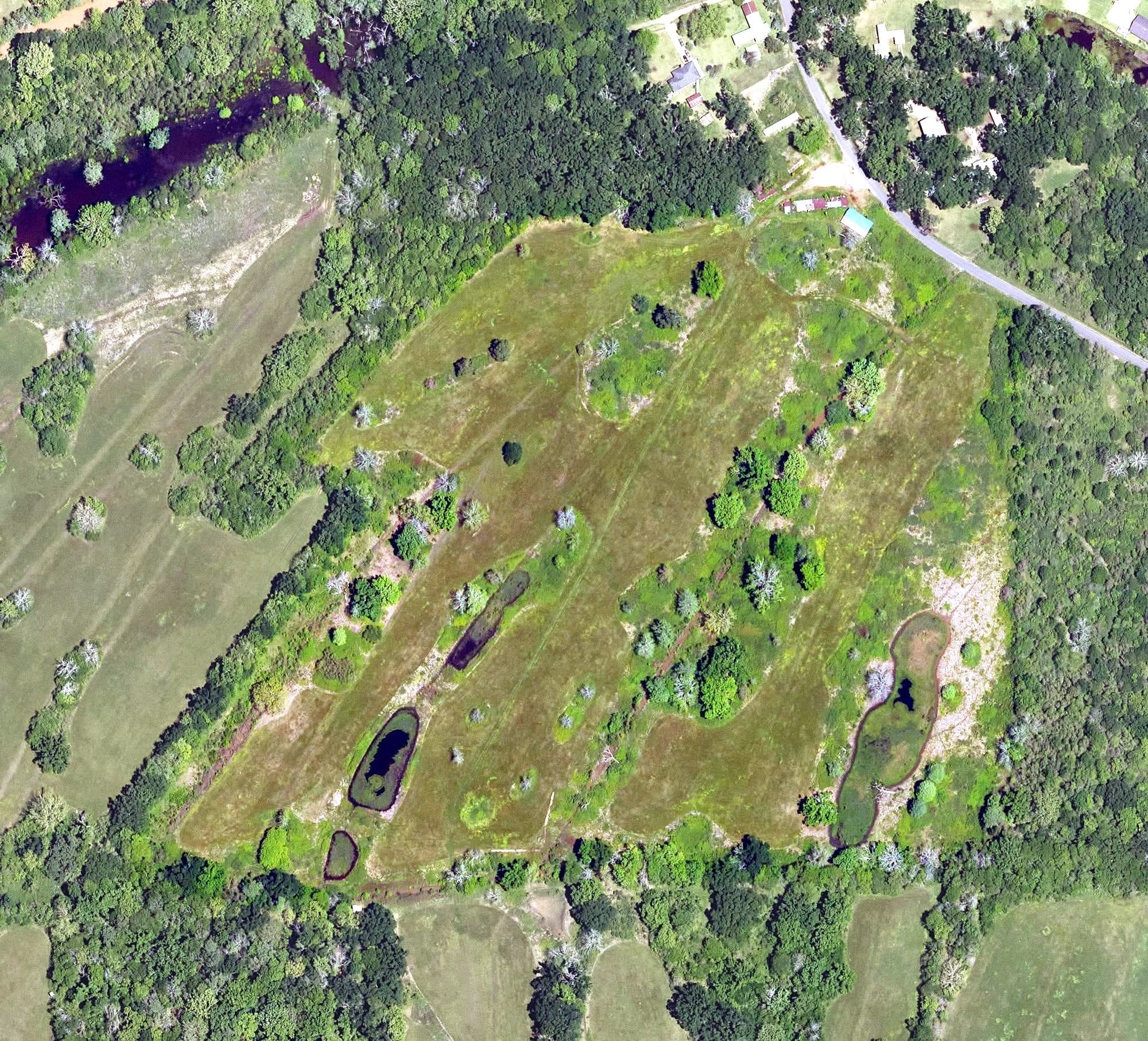 Aerial view of Spring Bayou Golf Course, LA, with its hole routing marked