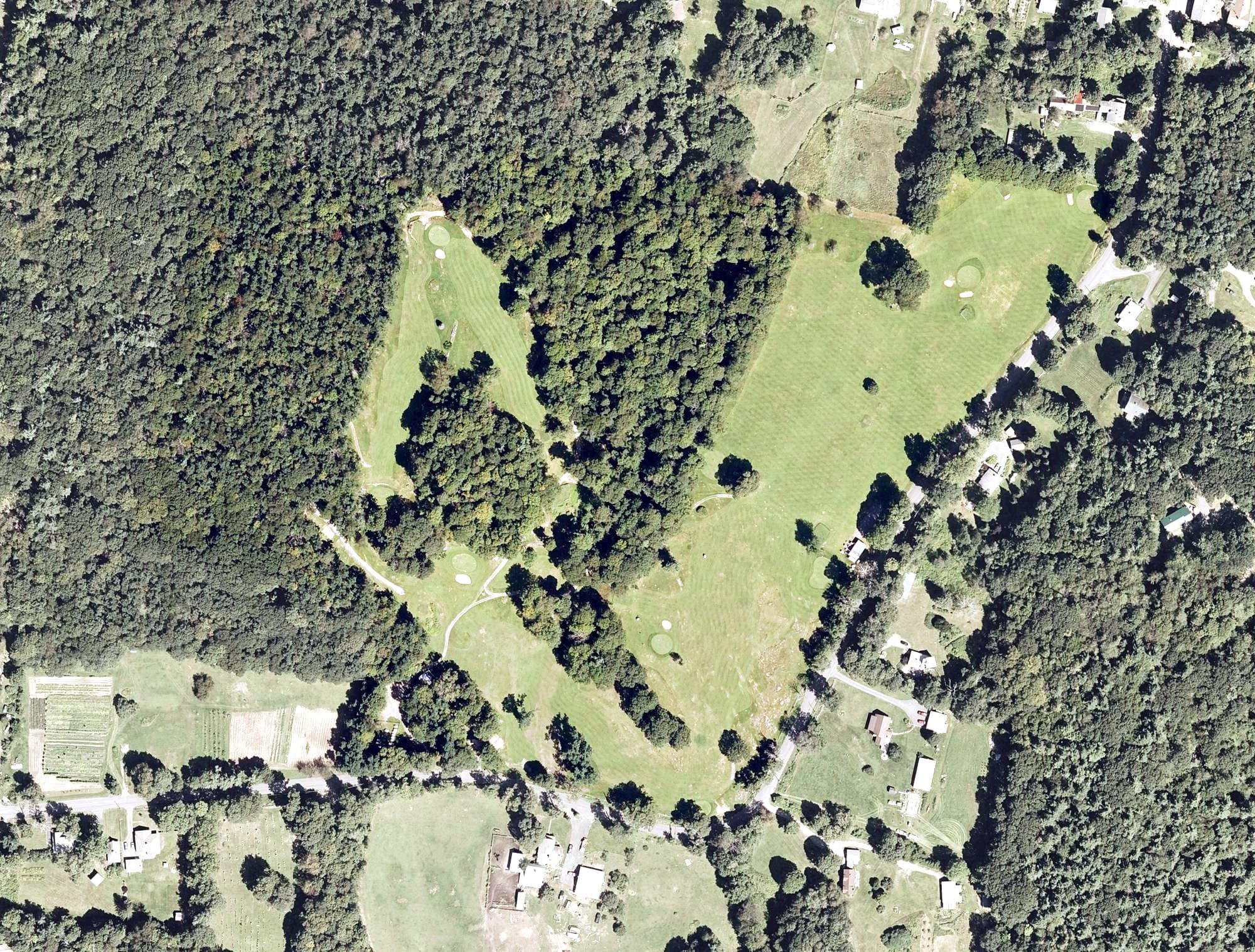 Aerial view of Ashfield Community Golf Course, MA, with its hole routing marked