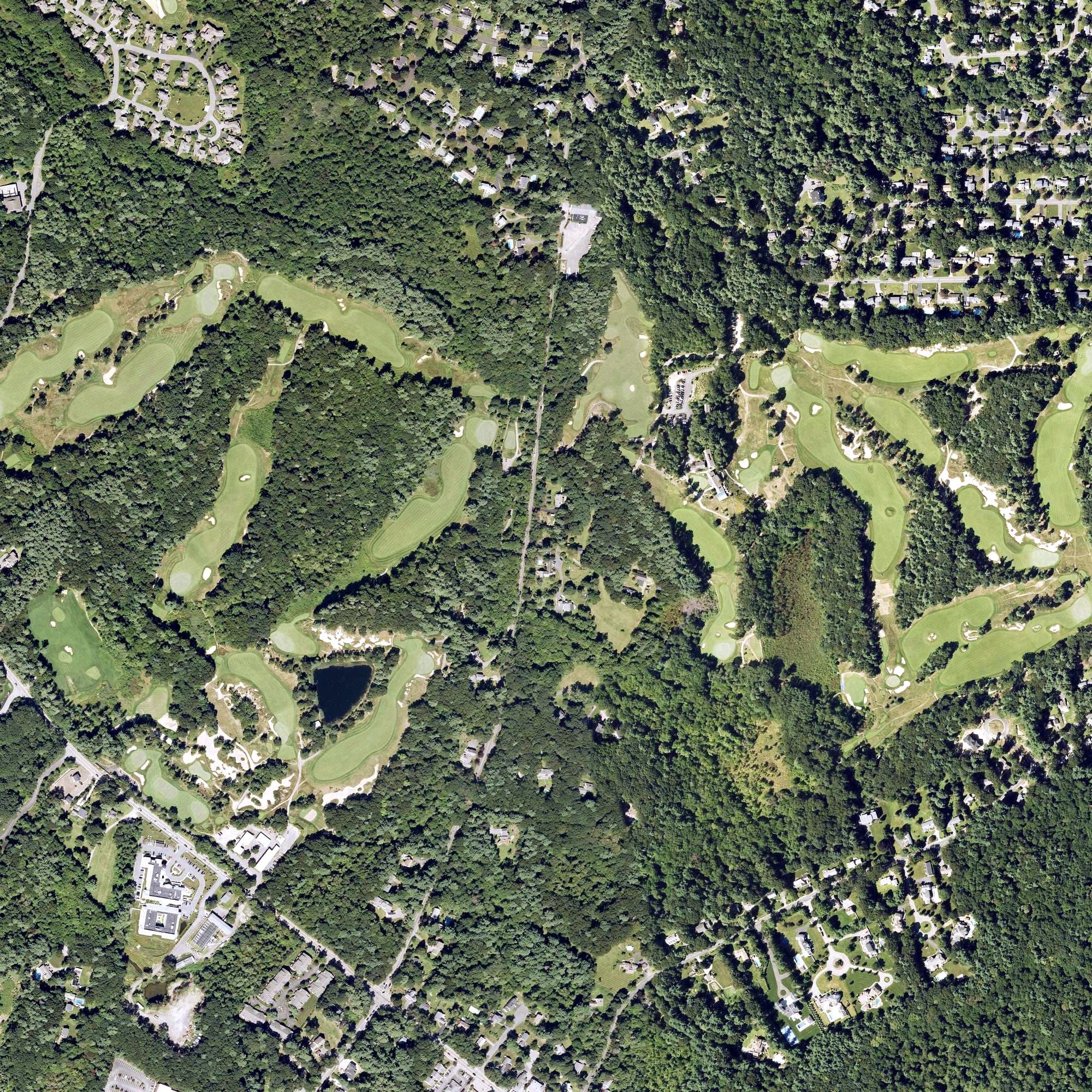 Aerial view of Boston Golf Club, MA, with its hole routing marked