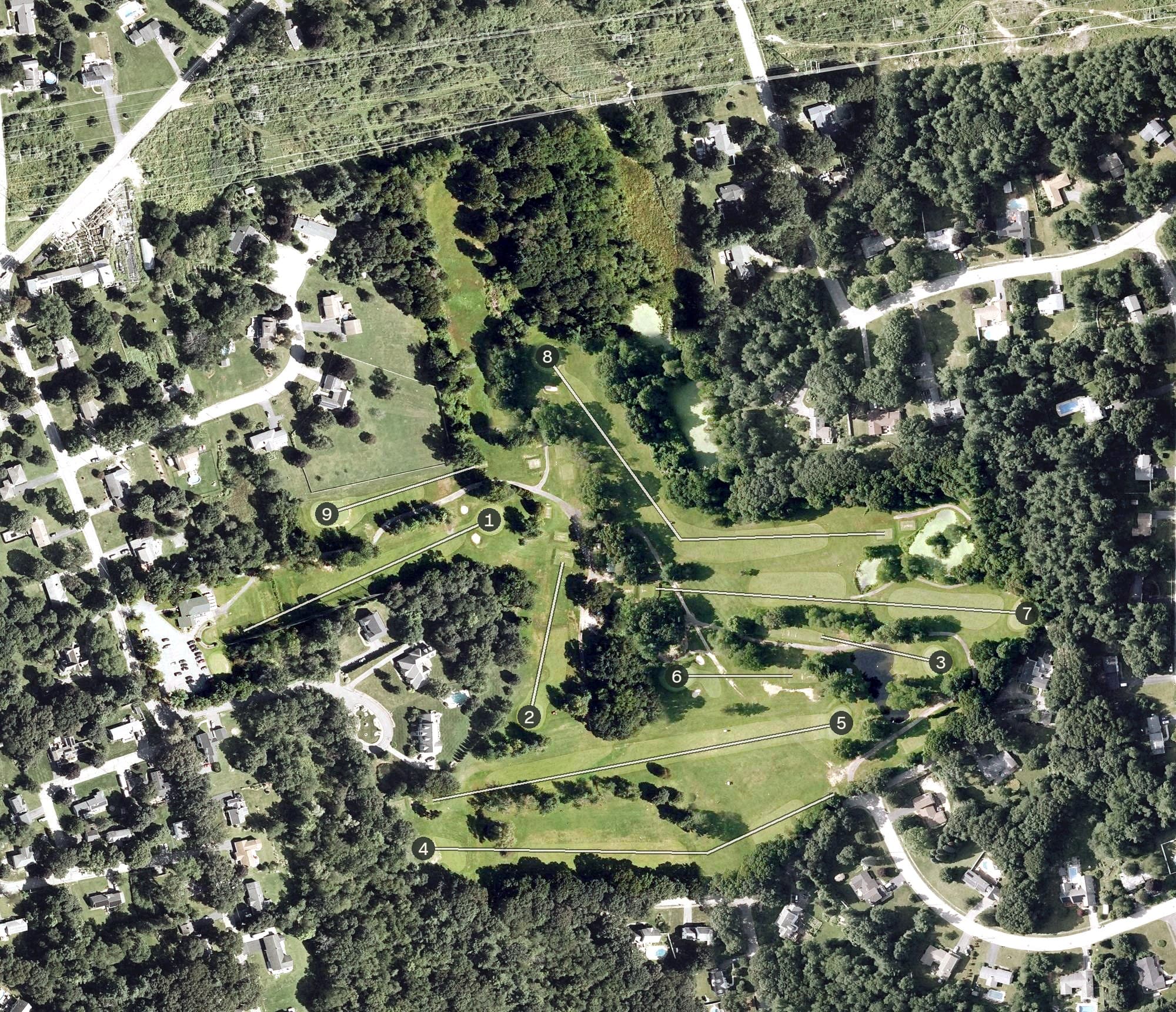 Aerial view of Chelmsford Country Club, MA, with its hole routing marked