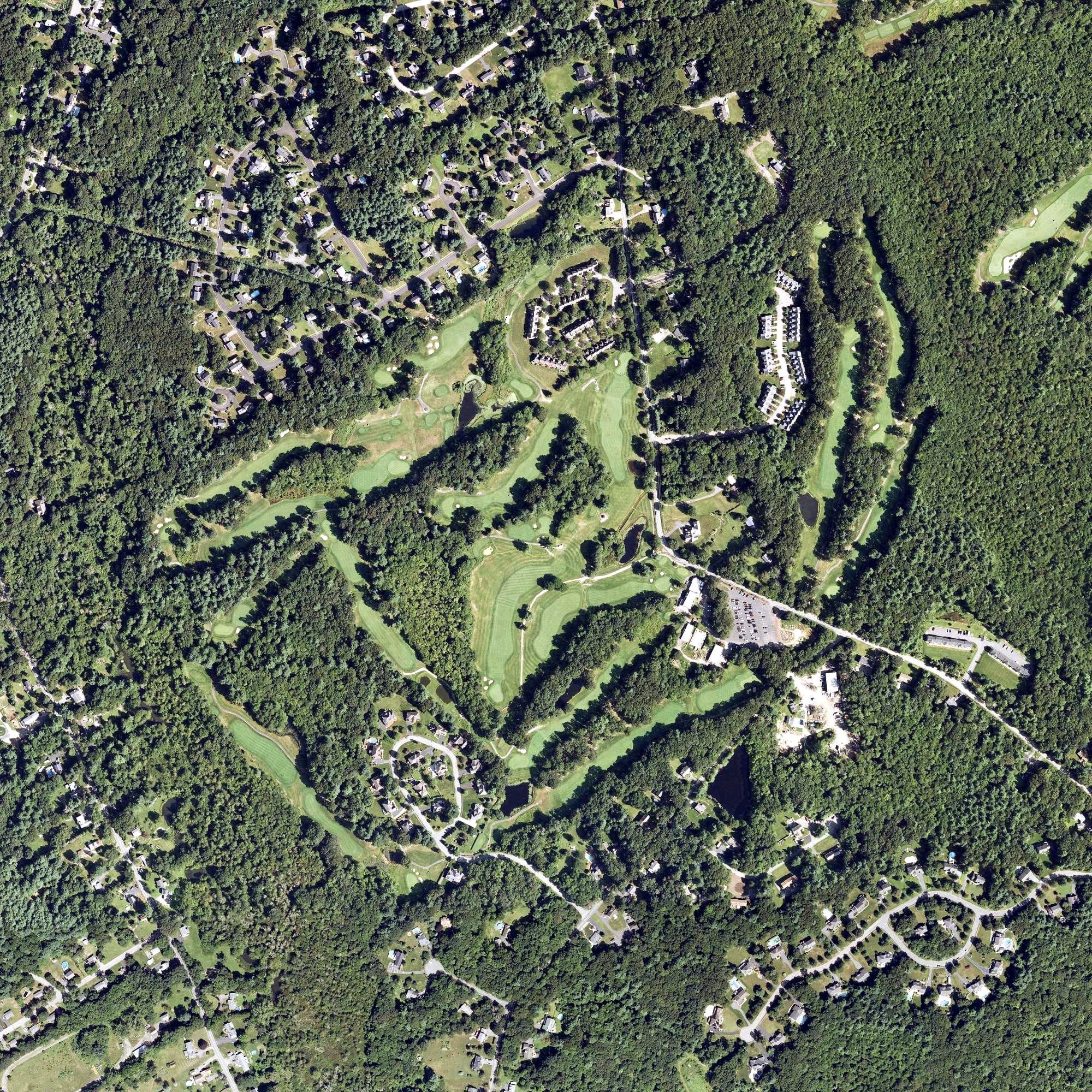 Aerial view of Norton Country Club, MA, with its hole routing marked