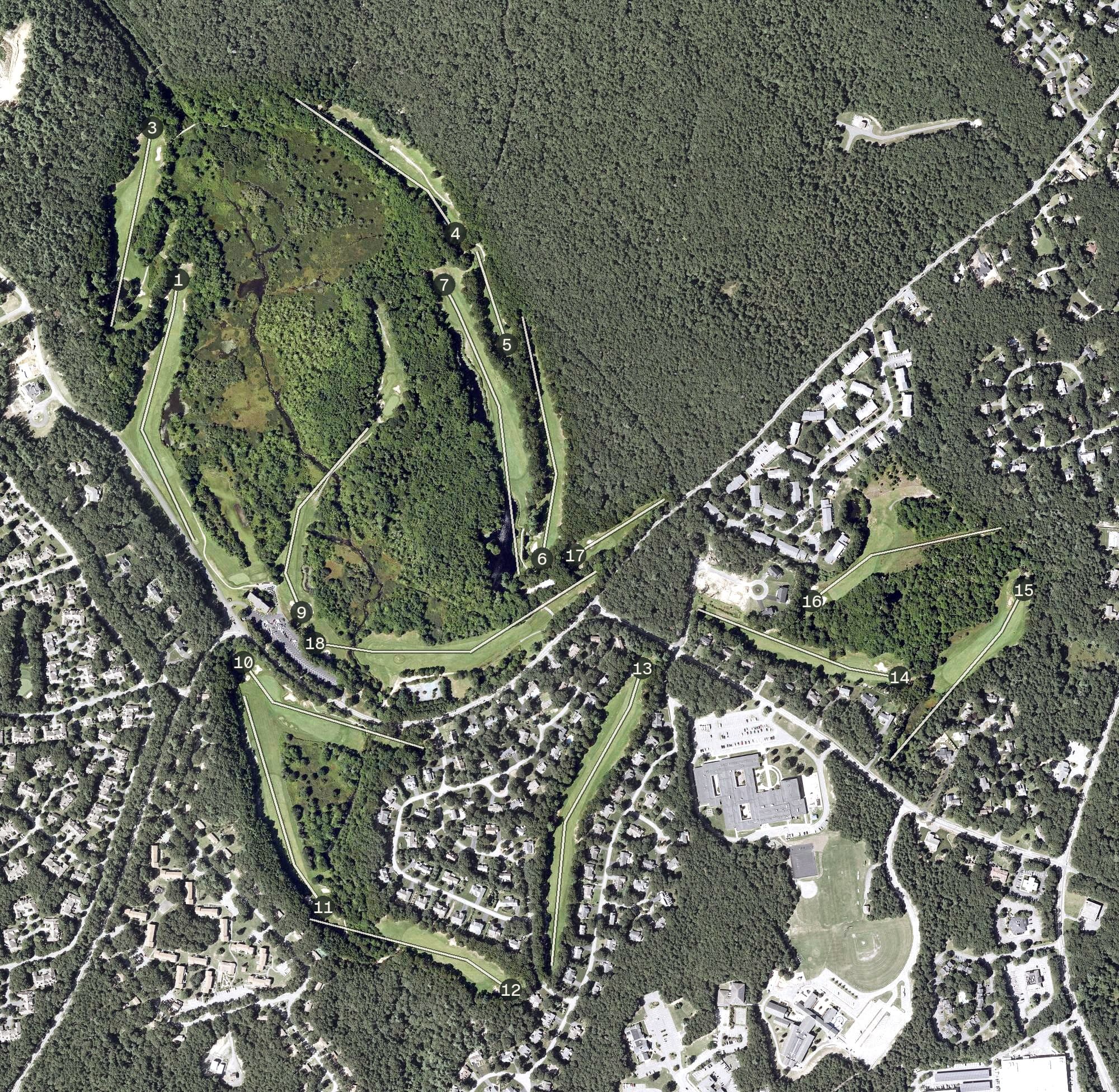 Aerial view of Quashnet Valley Golf Course, MA, with its hole routing marked
