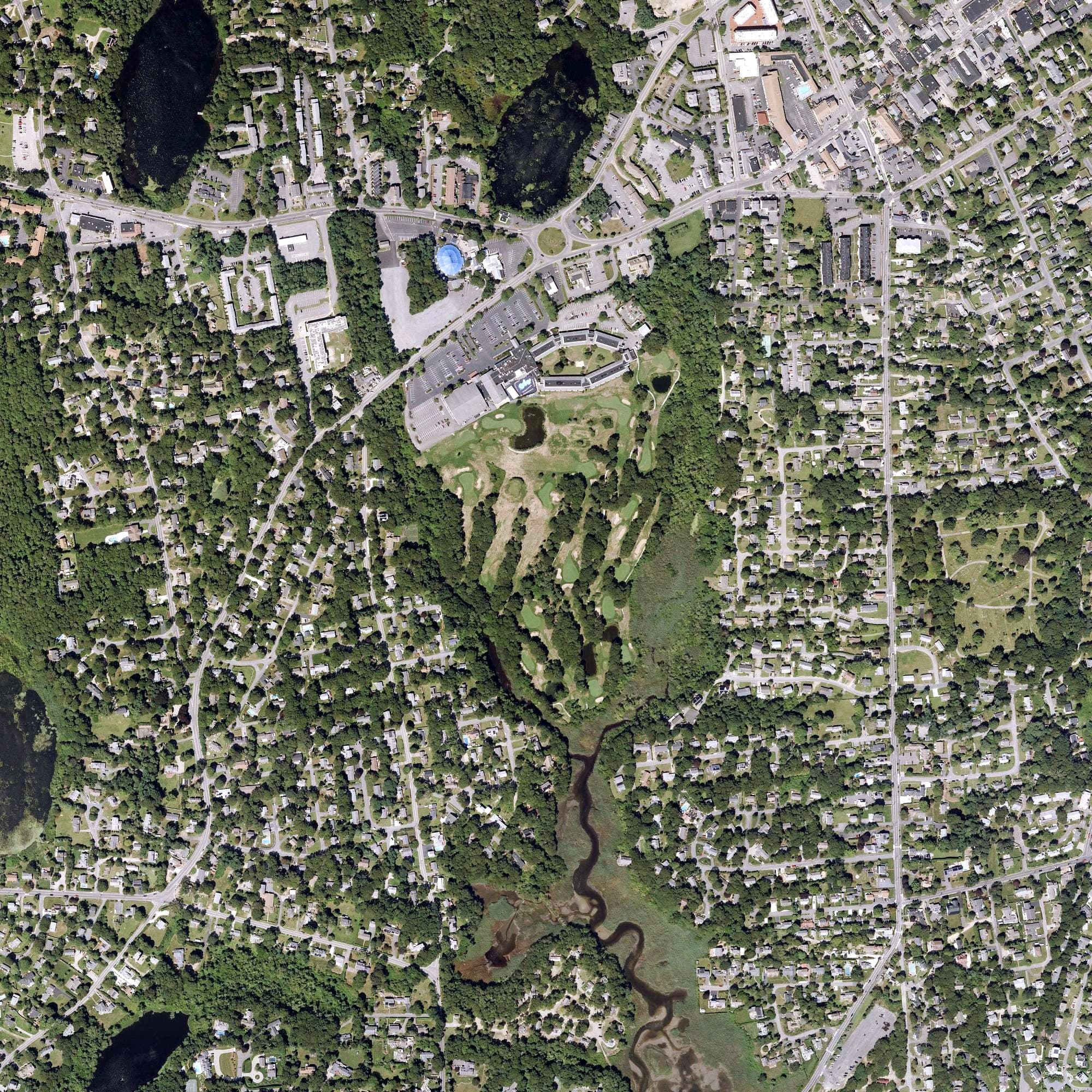 Aerial view of Twin Brooks Golf Course, MA, with its hole routing marked