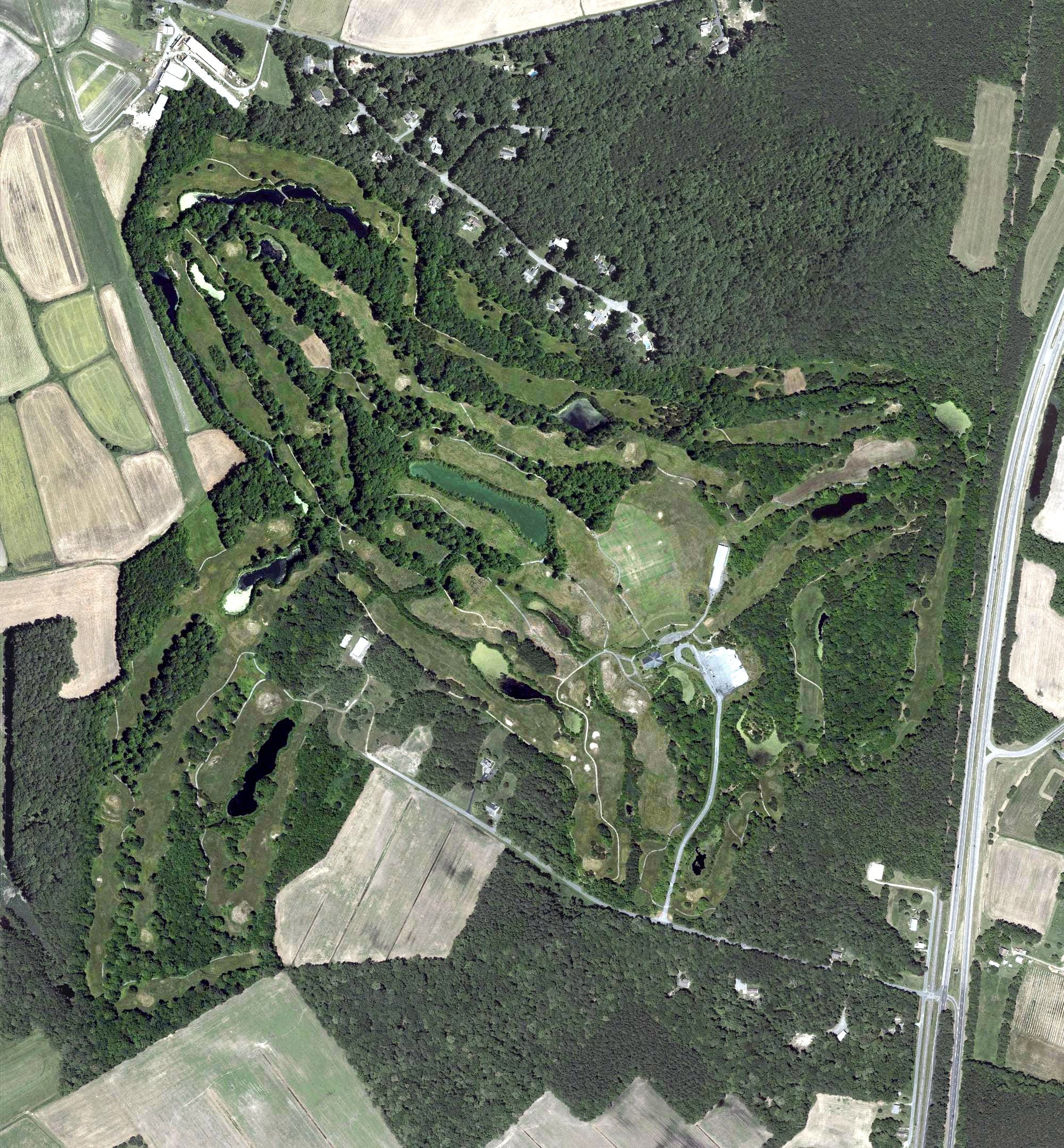 Aerial view of Beach Club Golf Links, MD, with its hole routing marked