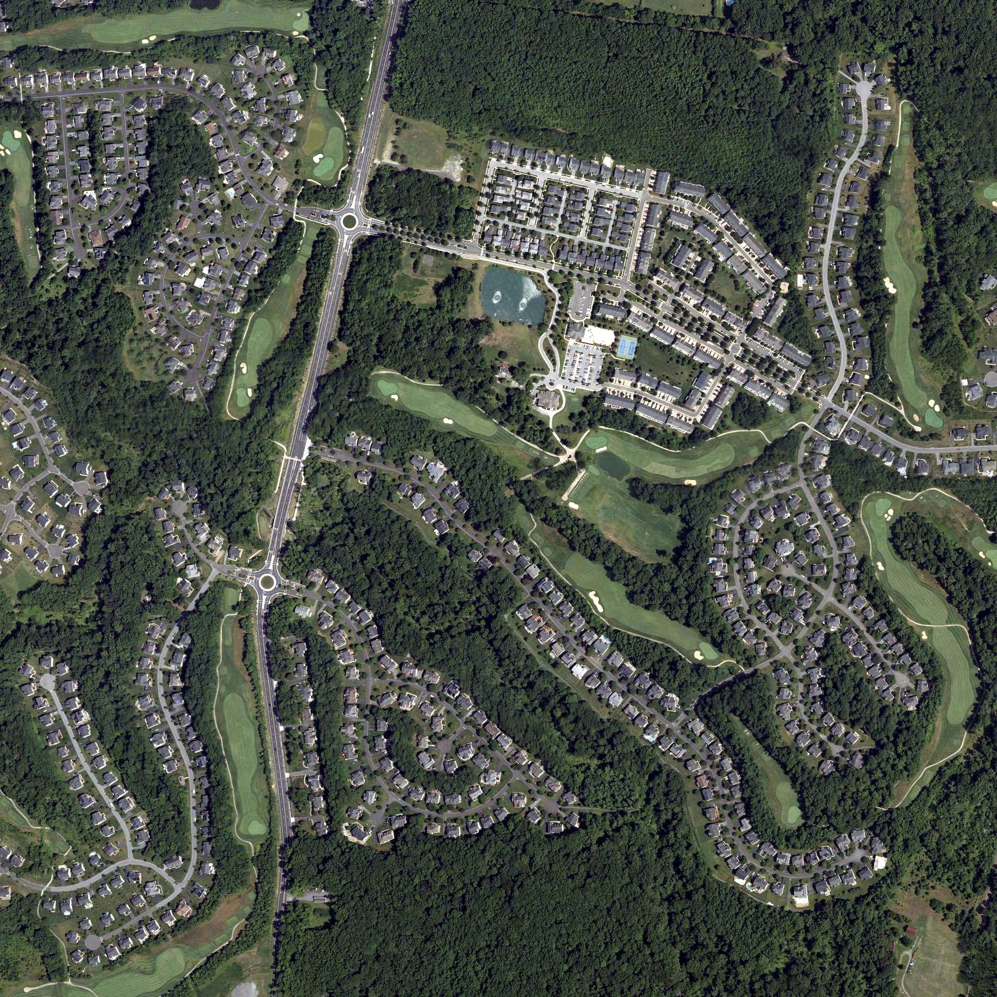 Aerial view of Oak Creek Golf Club, MD, with its hole routing marked