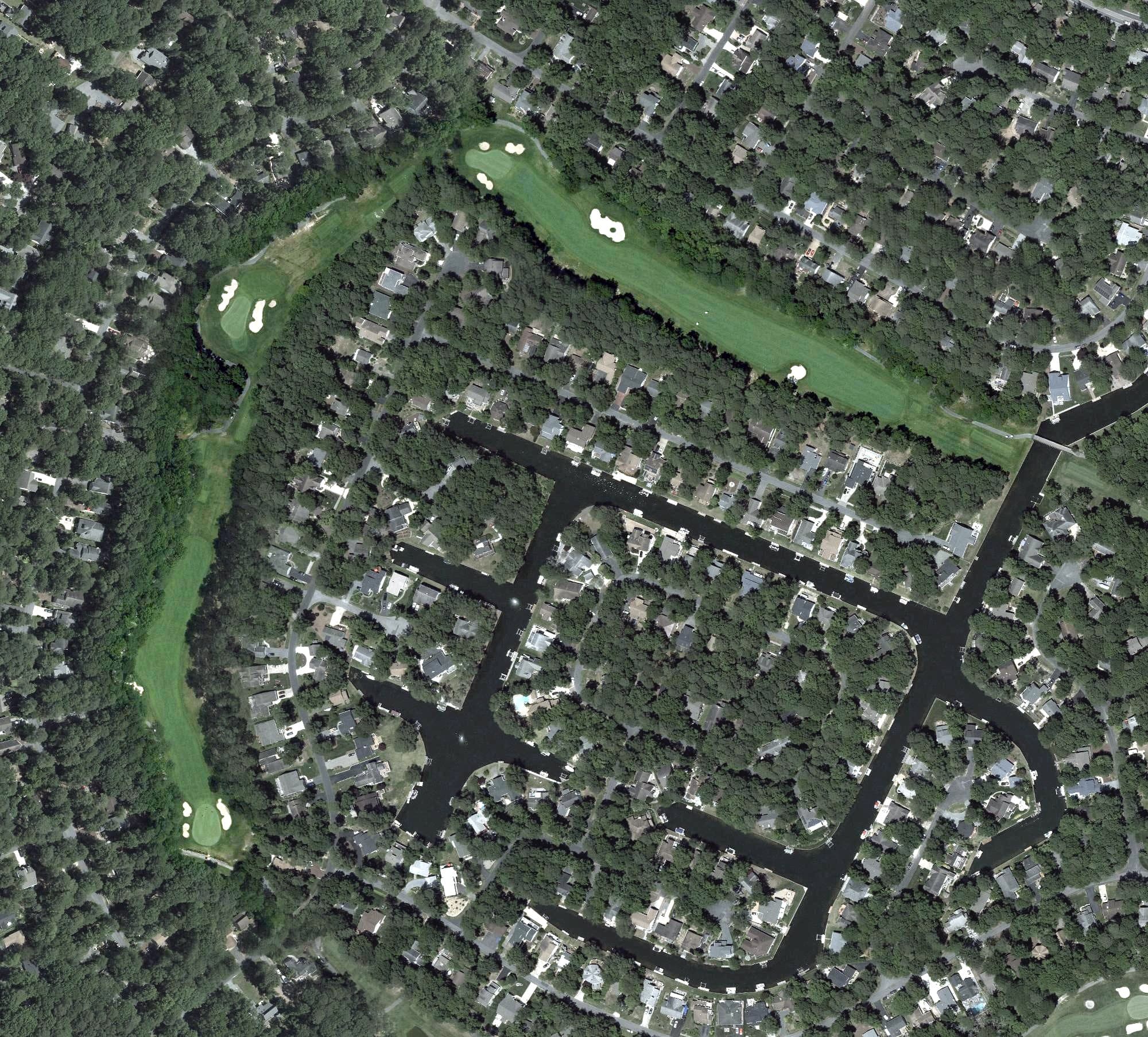 Aerial view of Ocean Pines Golf Course, MD, with its hole routing marked