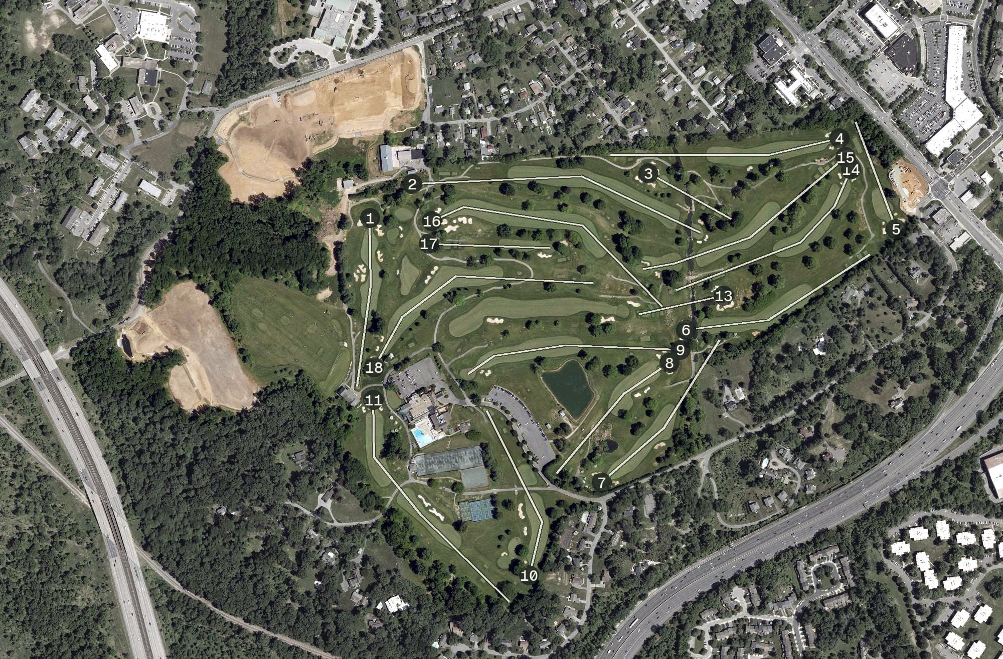 Aerial view of Woodholme Country Club, MD, with its hole routing marked