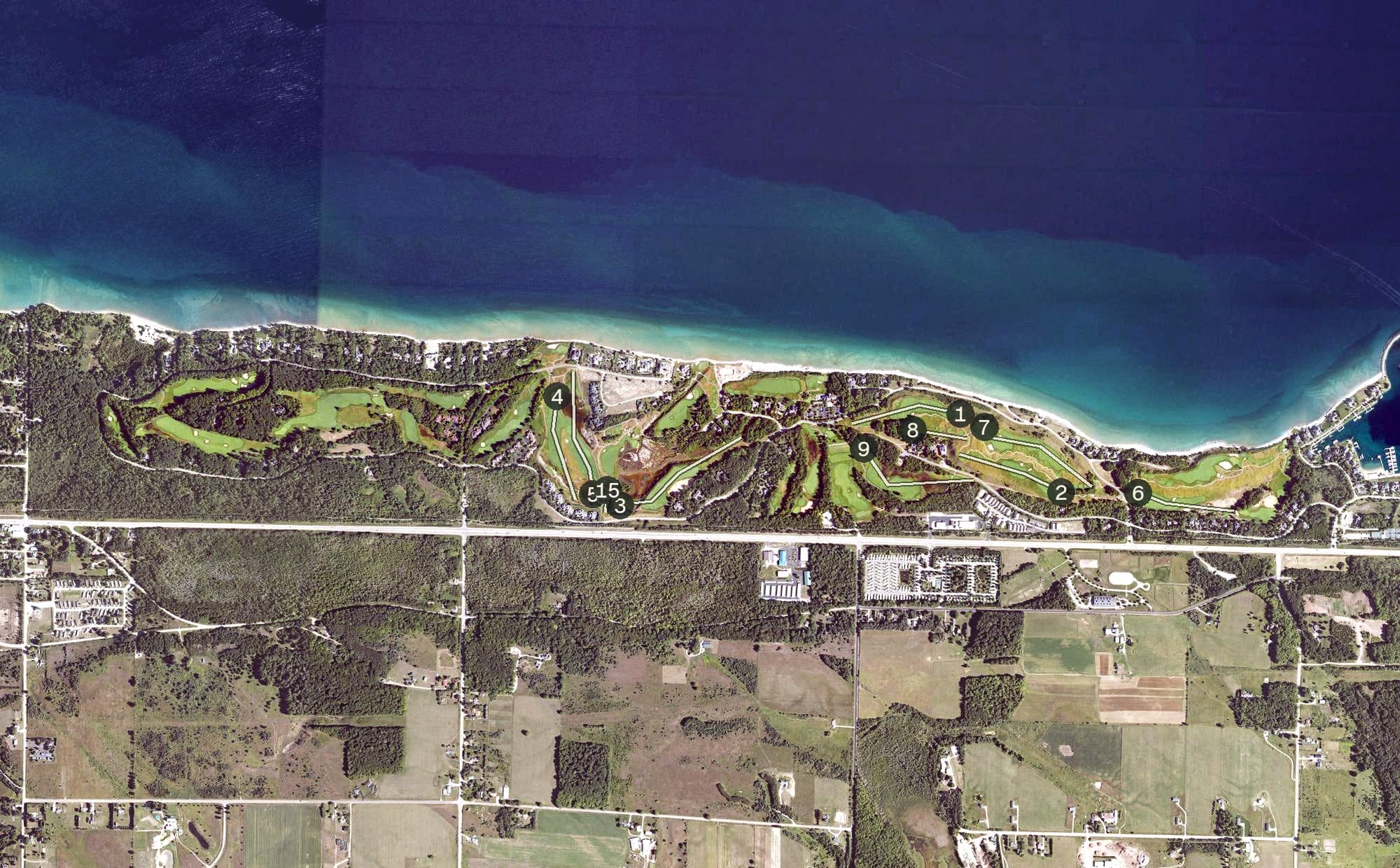 Aerial view of Bay Harbor Golf Club, MI, with its hole routing marked