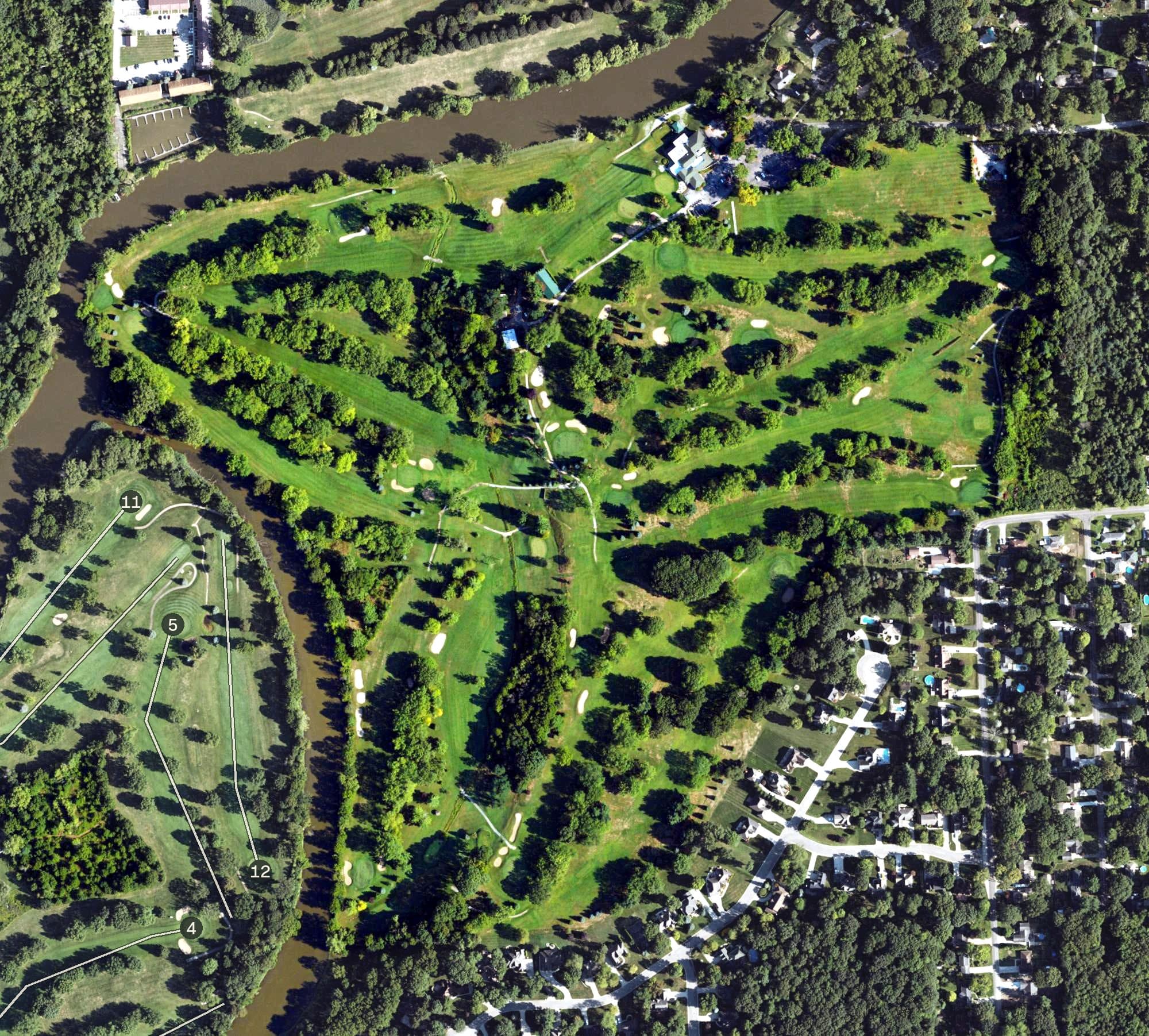 Aerial view of Black River Golf Club, MI, with its hole routing marked