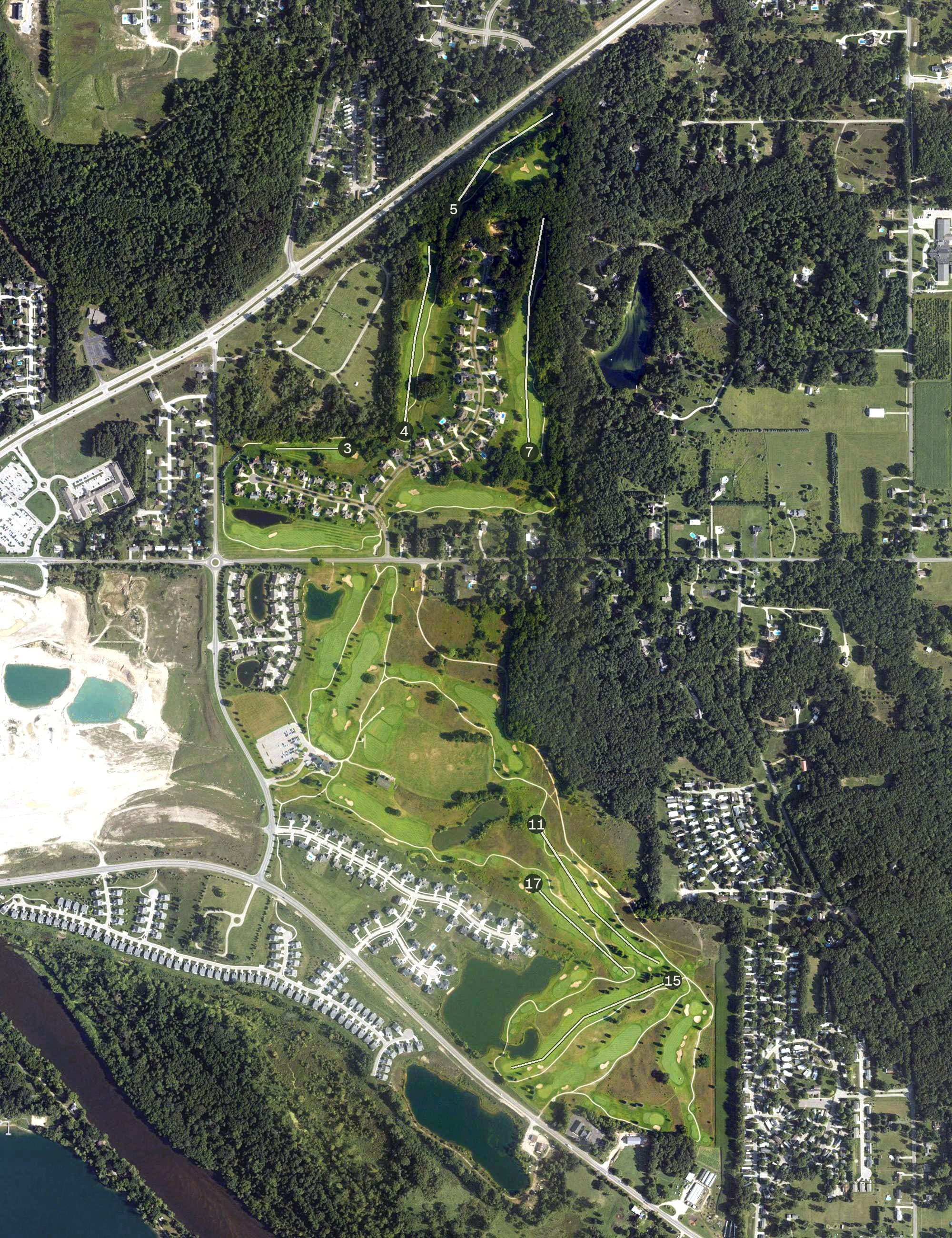 Aerial view of Boulder Creek Golf Club, MI, with its hole routing marked