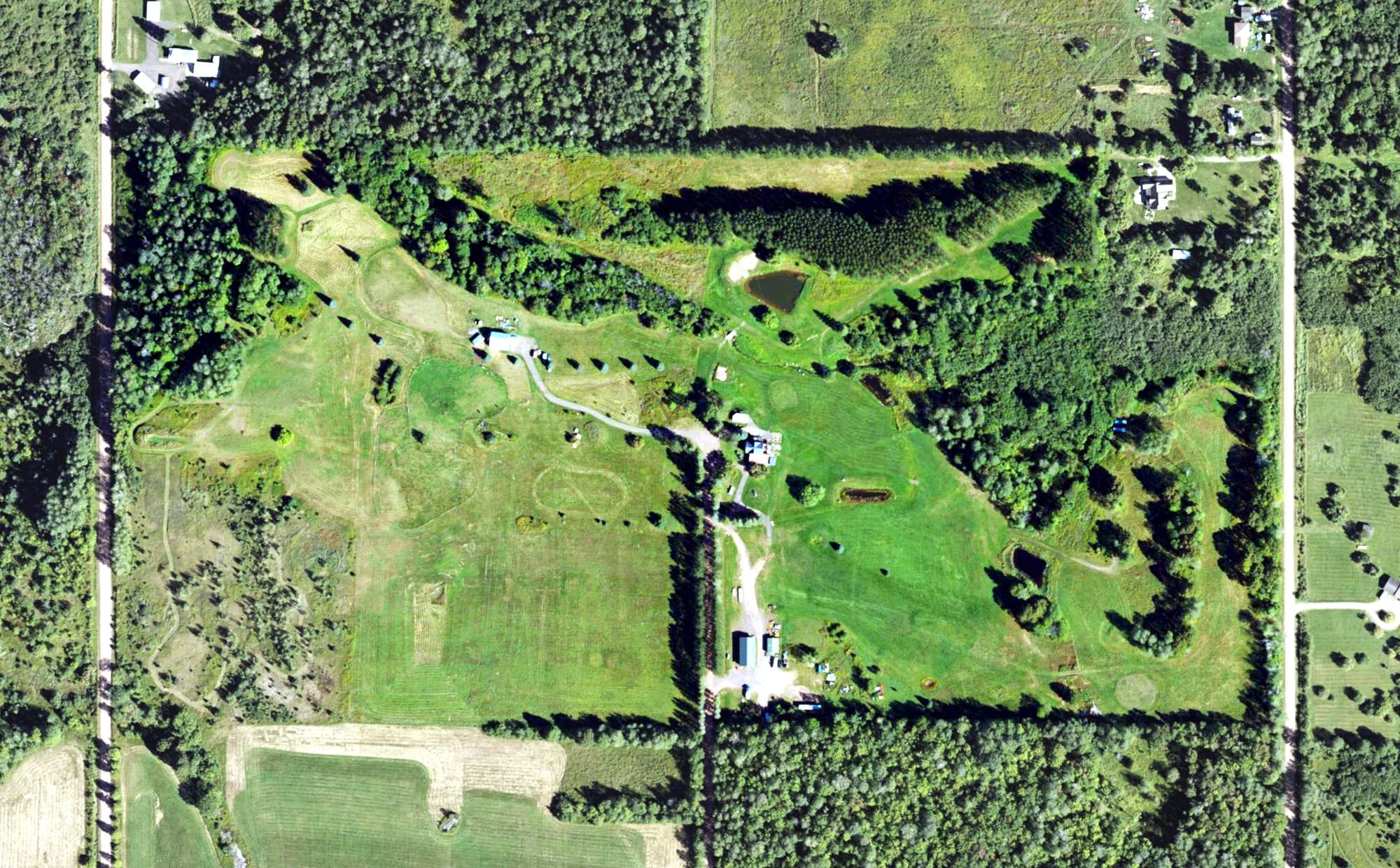 Aerial view of Boulder Creek Golf Course, MI, with its hole routing marked